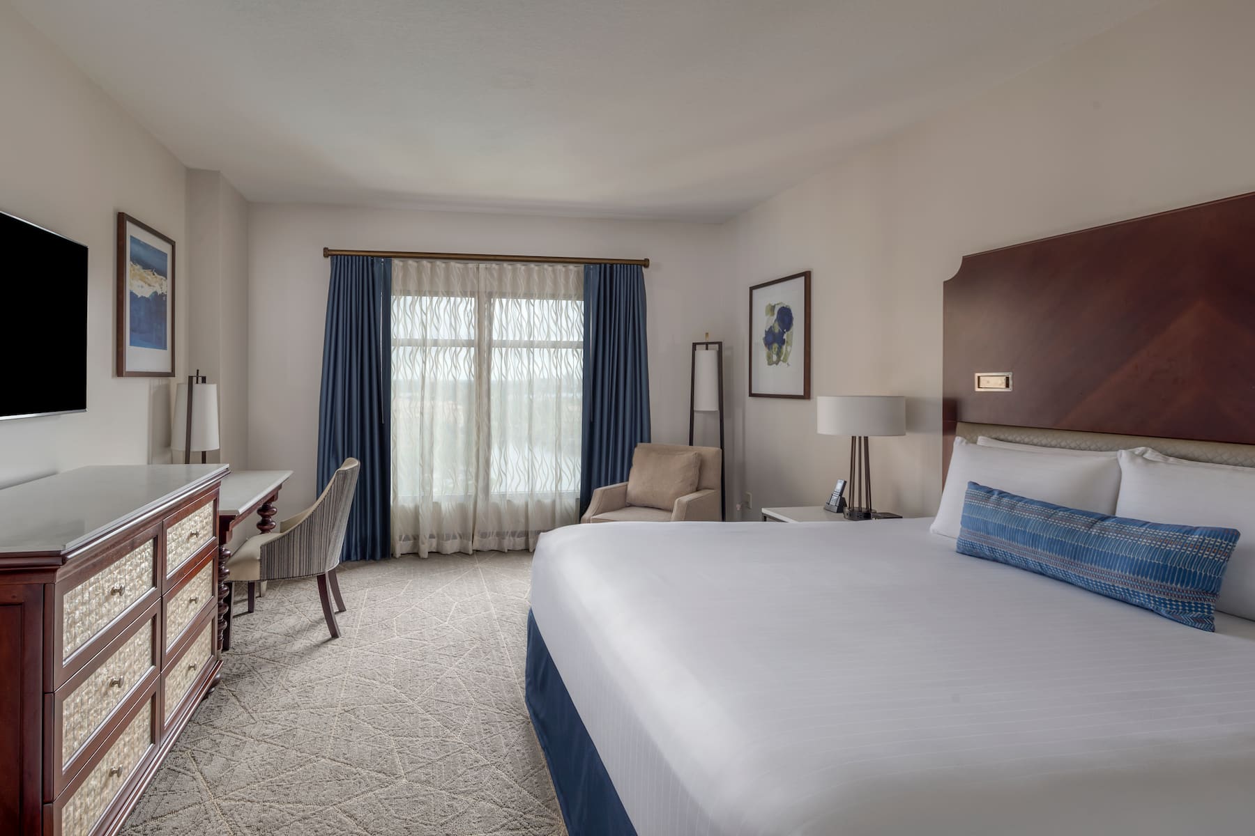 Guest room at the Wyndham Grand Orlando Resort Bonnet Creek in Orlando, Florida