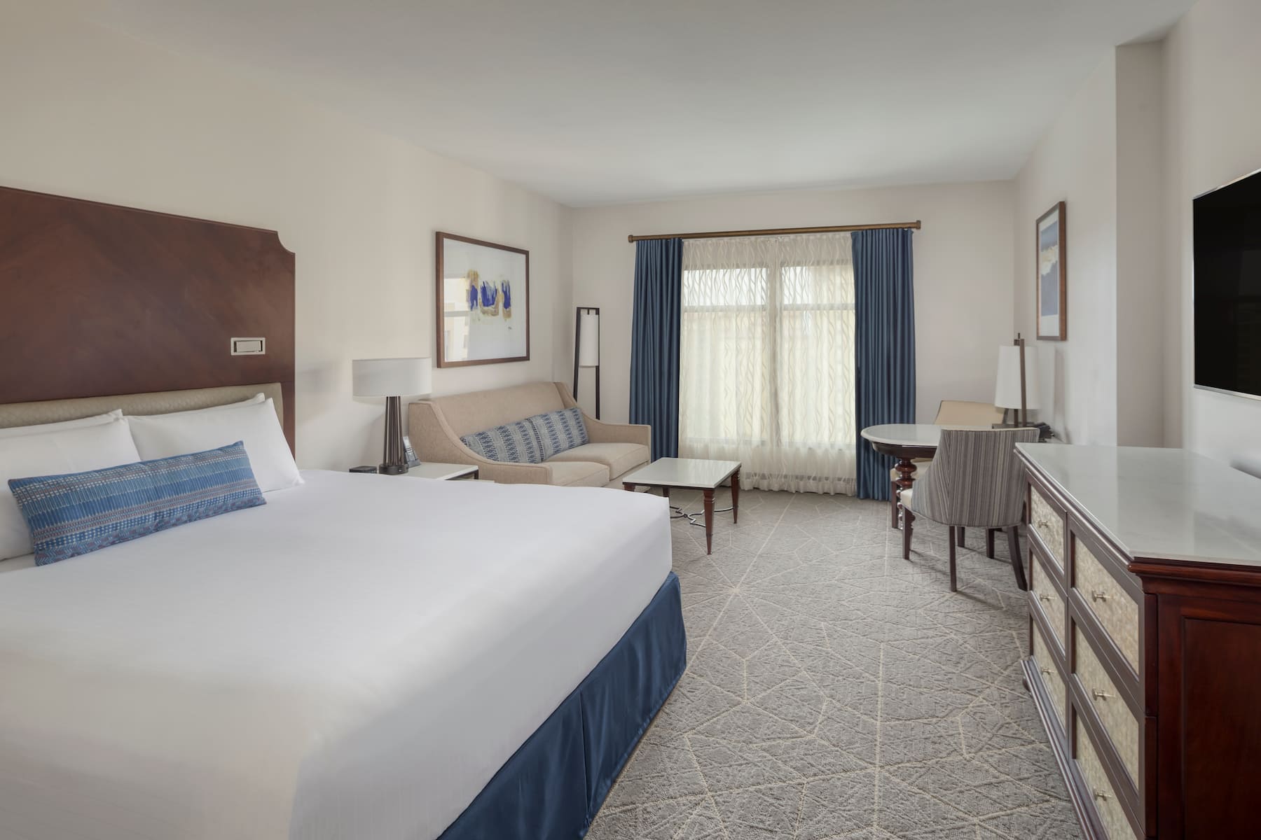 Guest room at the Wyndham Grand Orlando Resort Bonnet Creek in Orlando, Florida