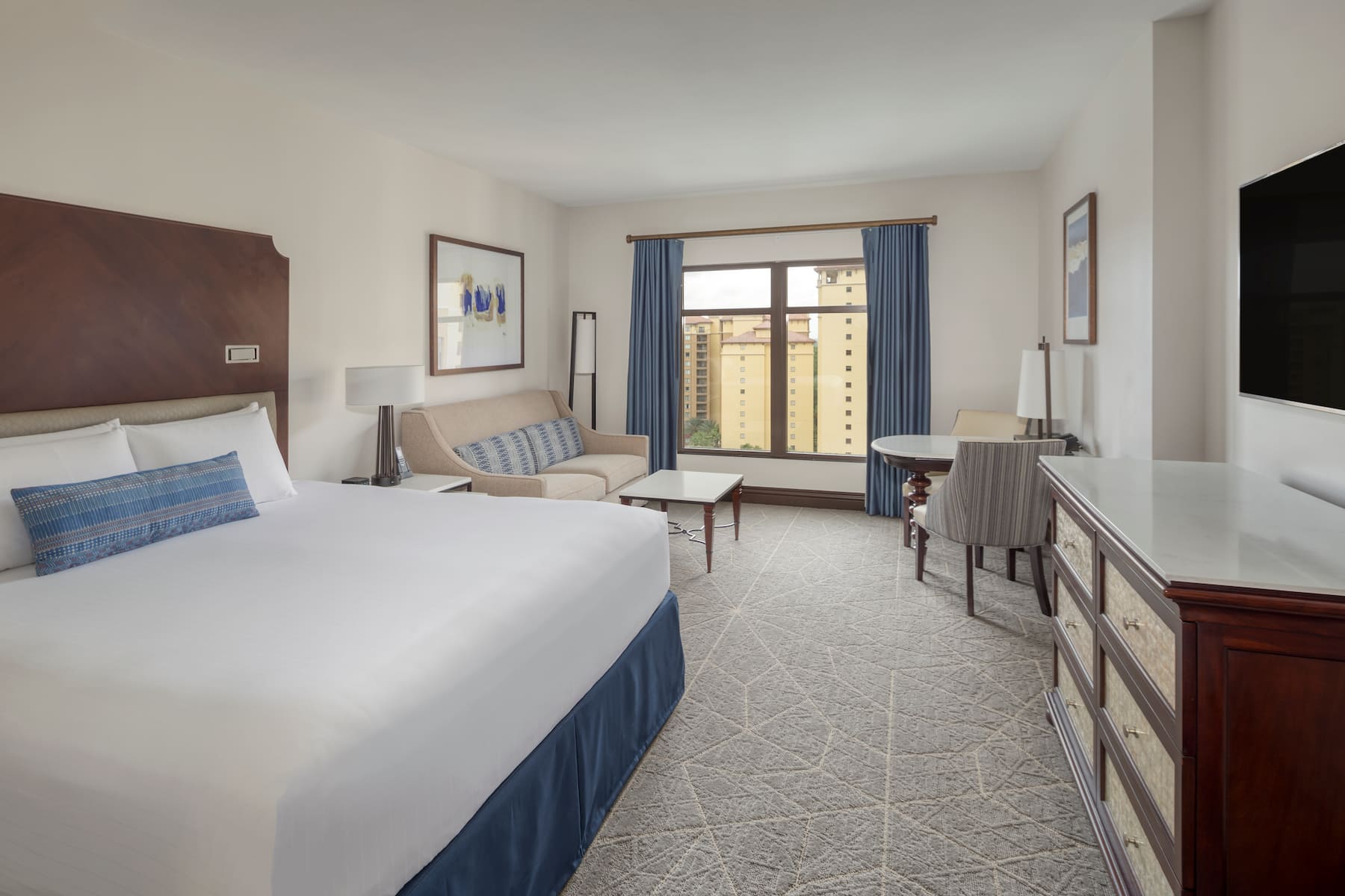 Guest room at the Wyndham Grand Orlando Resort Bonnet Creek in Orlando, Florida
