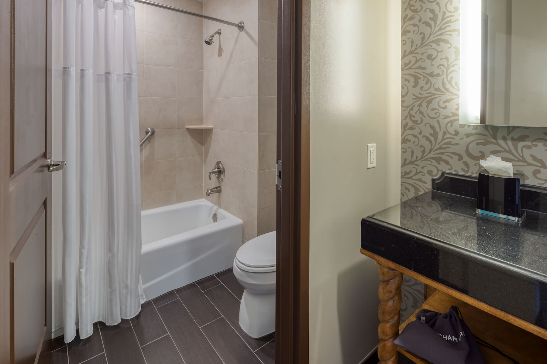 Guest room bath at the Wyndham Grand Orlando Resort Bonnet Creek in Orlando, Florida