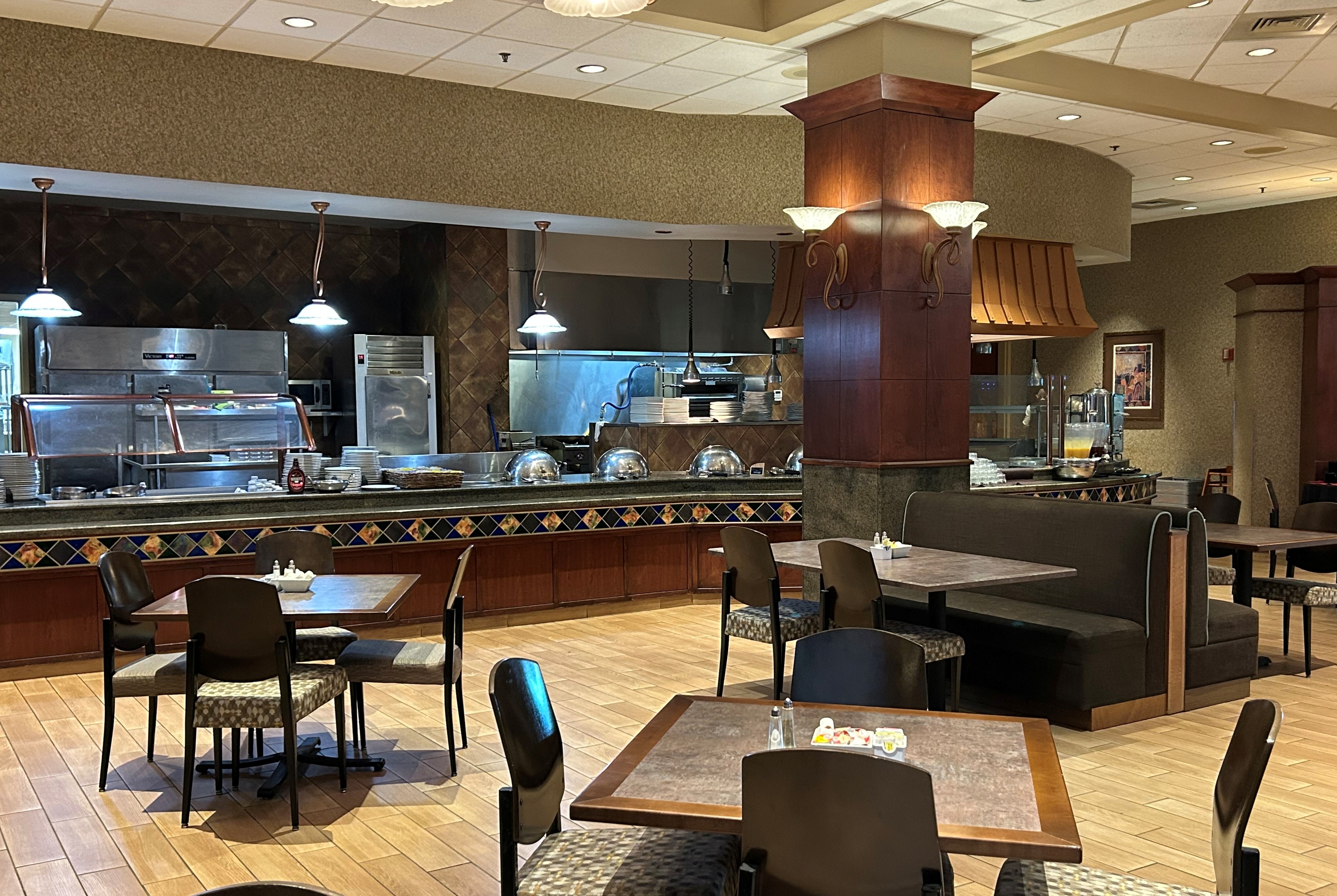 Wyndham Grand Topeka Executive Center restaurant breakfast area with seating in Topeka, Kansas