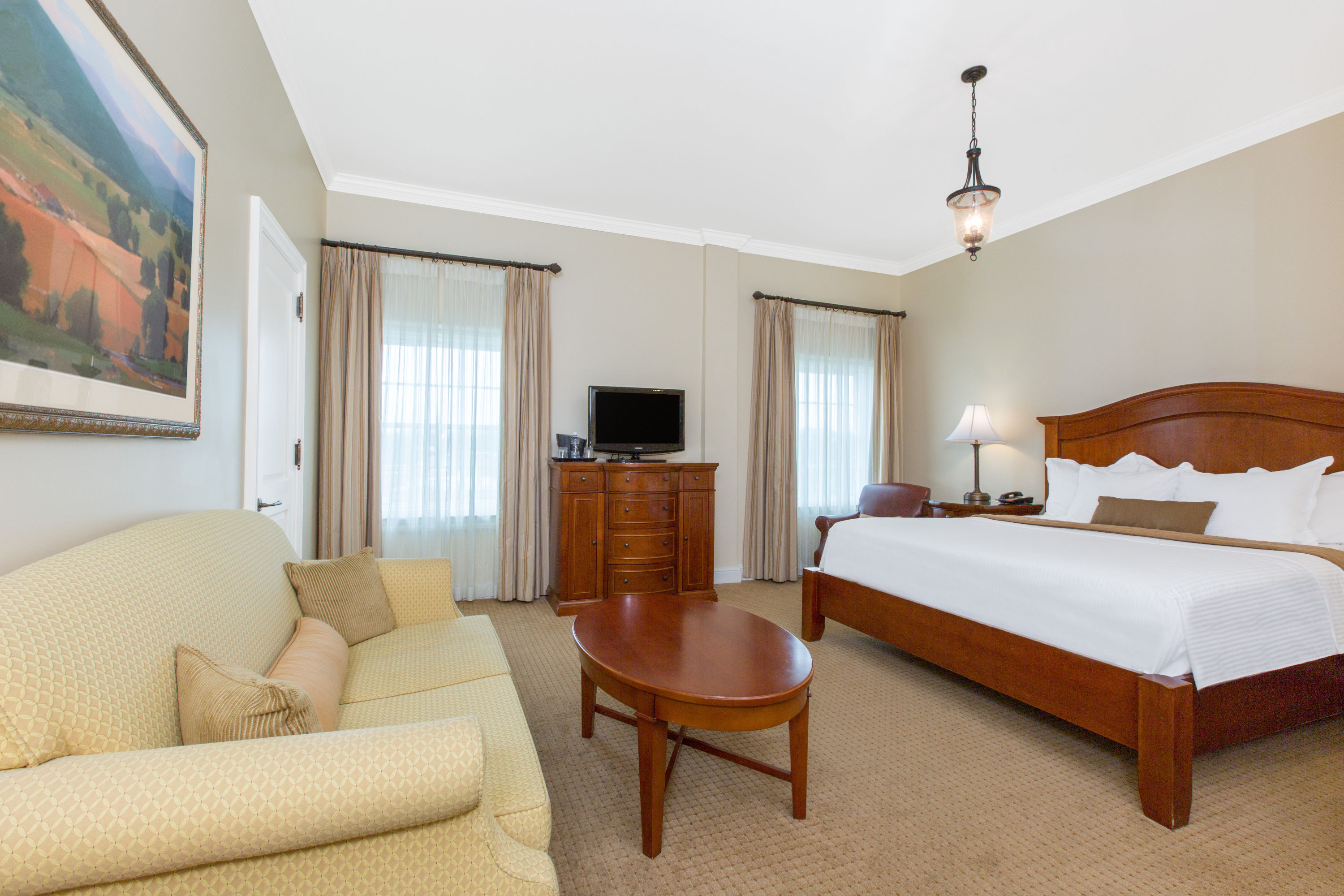 Guest room at the The George Washington, a Wyndham Grand Hotel in Winchester, Virginia