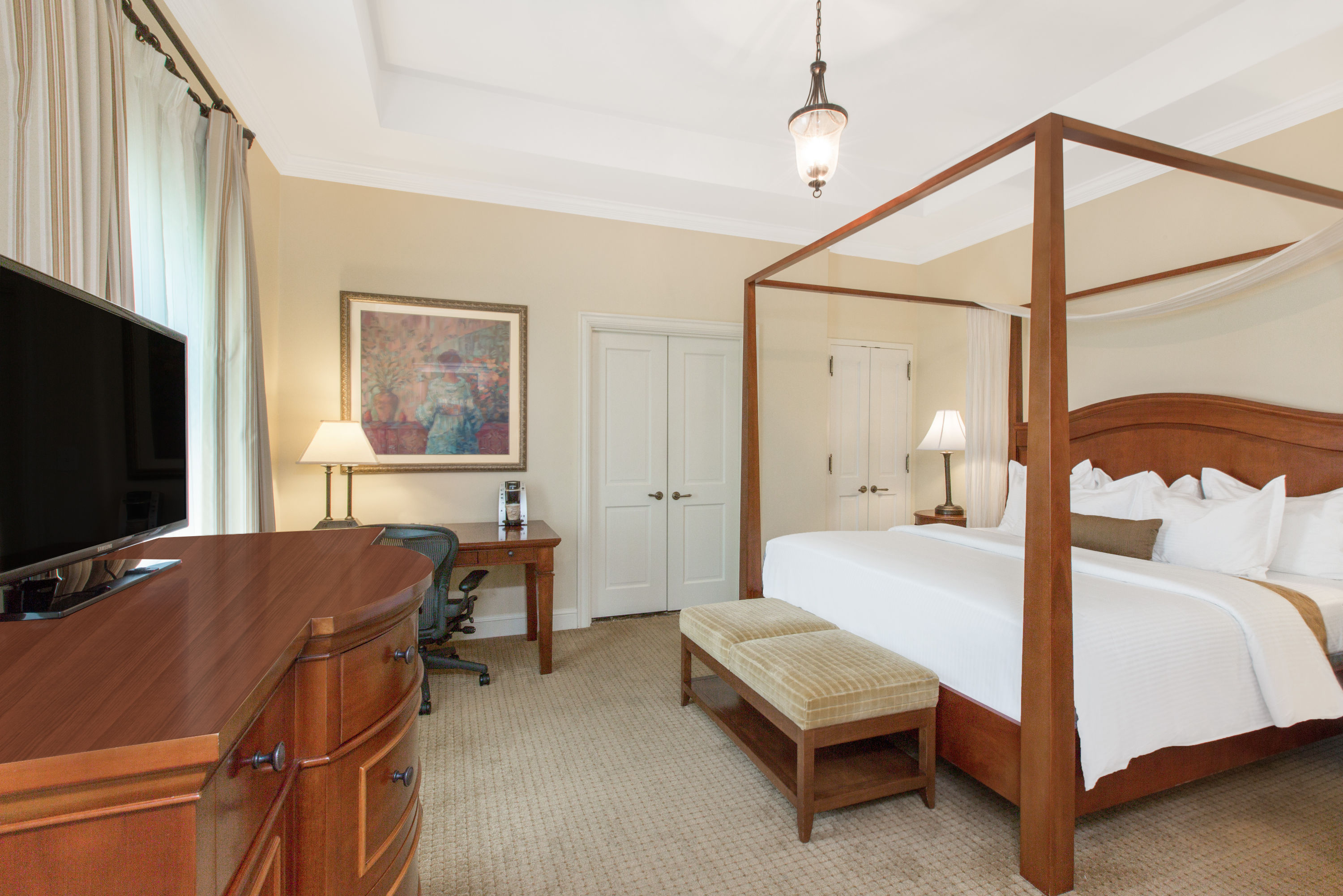 Guest room at the The George Washington, a Wyndham Grand Hotel in Winchester, Virginia