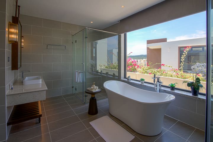 Guest room bath at the Wyndham Grand KN Paradise Cam Ranh in Cam Ranh, Other than US/Canada