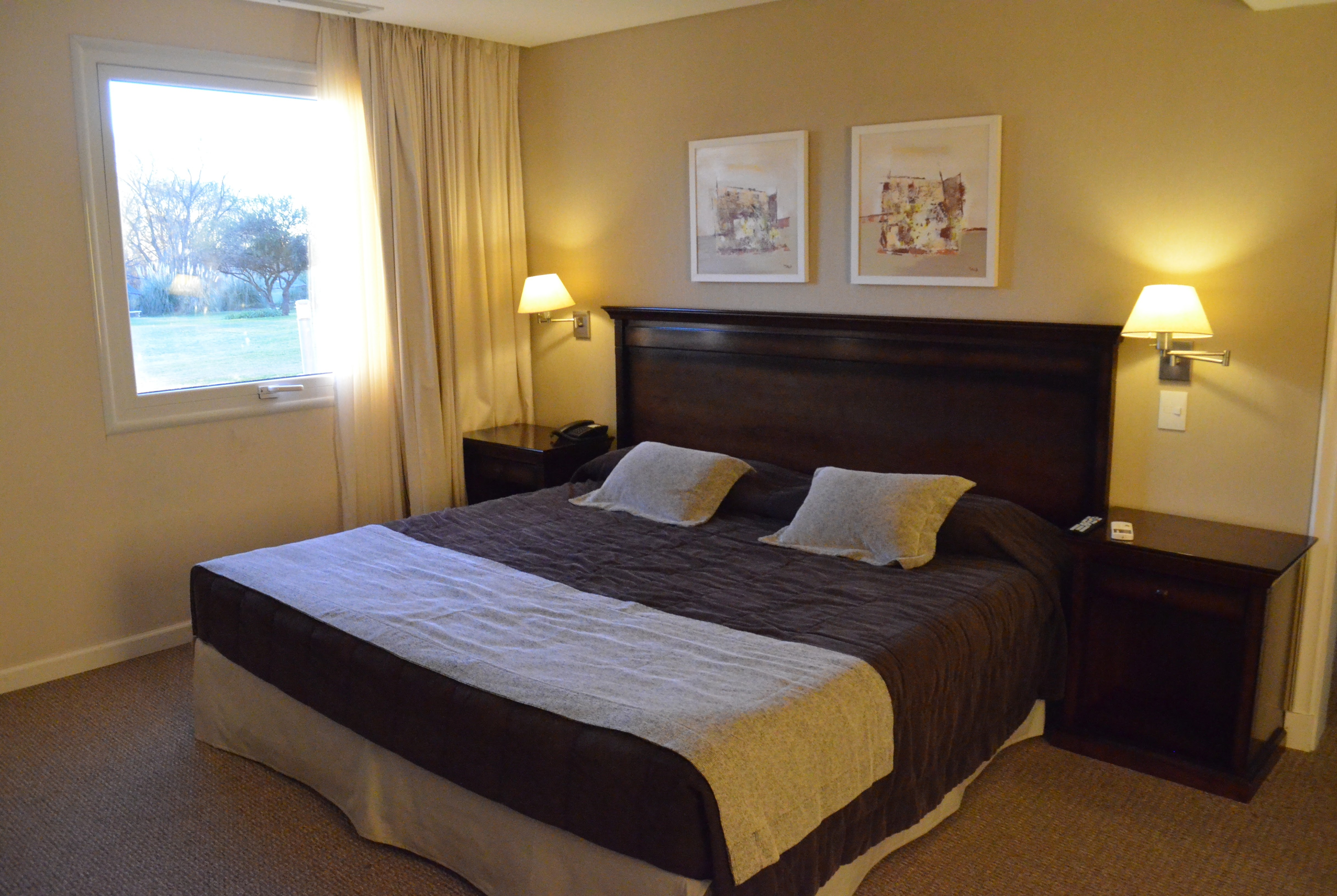 Guest room at the Howard Johnson Hotel & Convention Center by Wyndham, Merlo in Merlo, Other than US/Canada