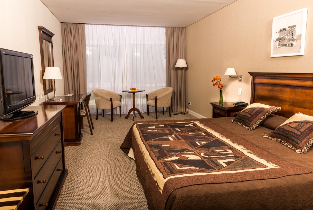 Guest room at the Howard Johnson Hotel & Convention Center by Wyndham, Merlo in Merlo, Other than US/Canada