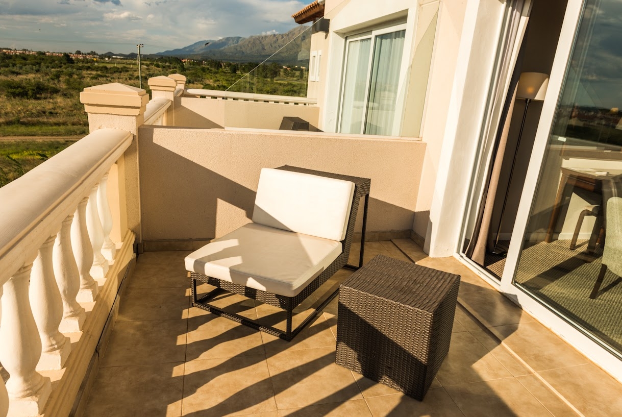 Guest room at the Howard Johnson Hotel & Convention Center by Wyndham, Merlo in Merlo, Other than US/Canada