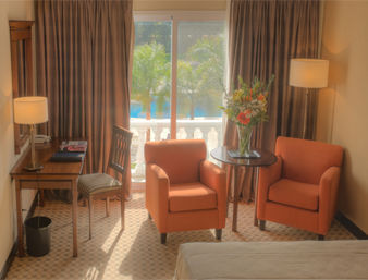 Guest room at the Howard Johnson by Wyndham Resort Pilar in Pilar, Other than US/Canada