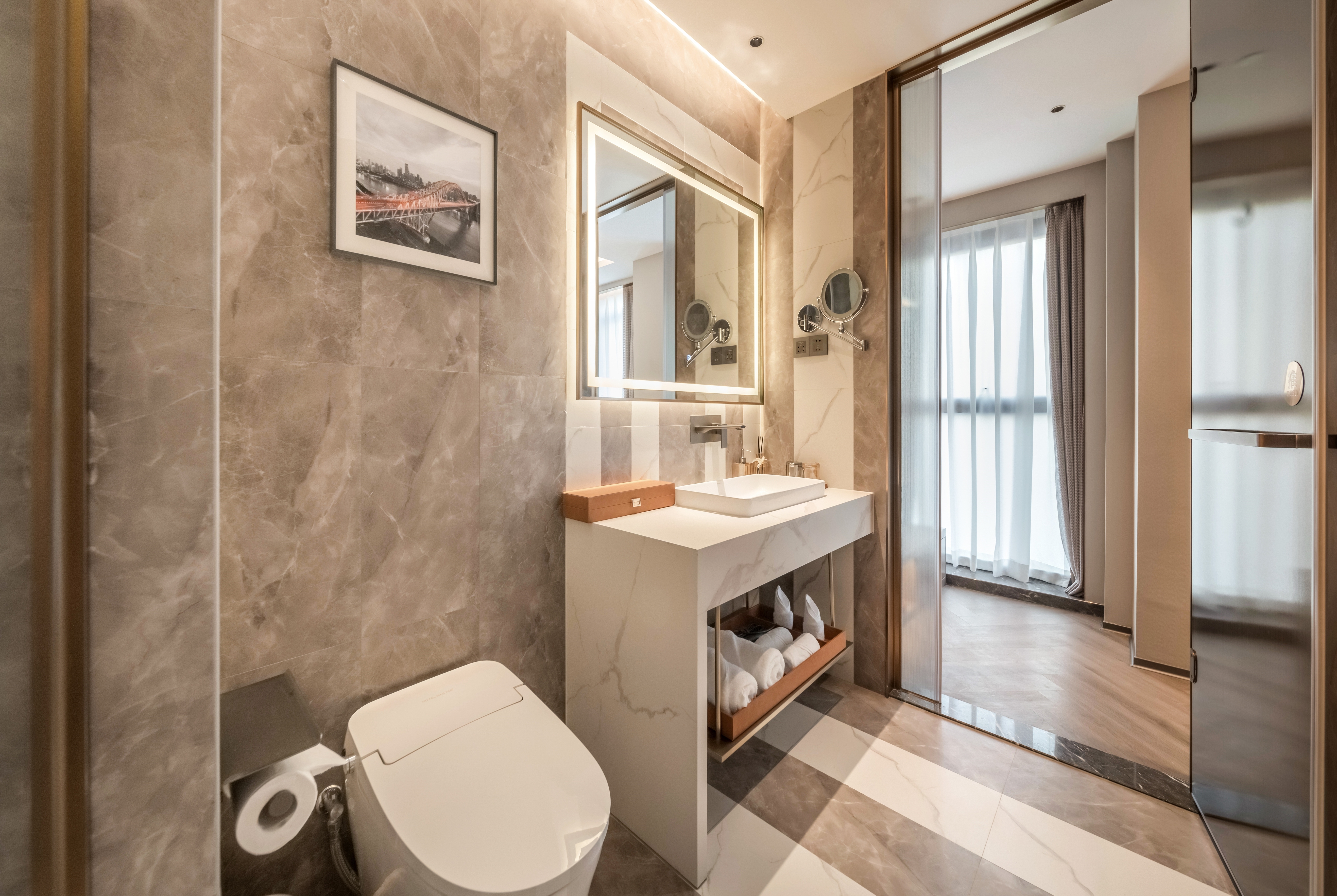 Guest room bath at the Howard Johnson Life Hotel by Wyndham Chongqing Liangjiang in Chongqing, Other than US/Canada