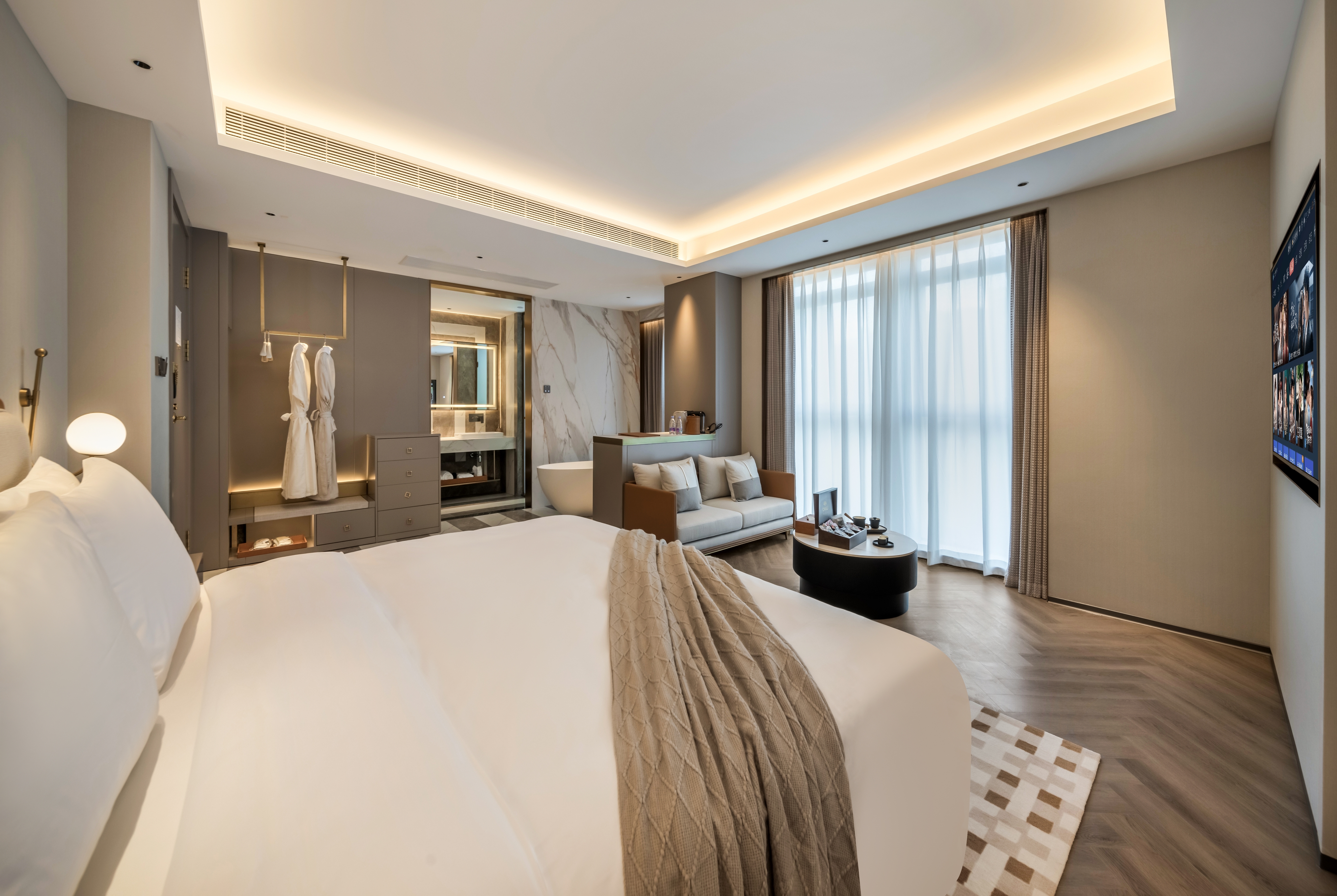 Guest room at the Howard Johnson Life Hotel by Wyndham Chongqing Liangjiang in Chongqing, Other than US/Canada