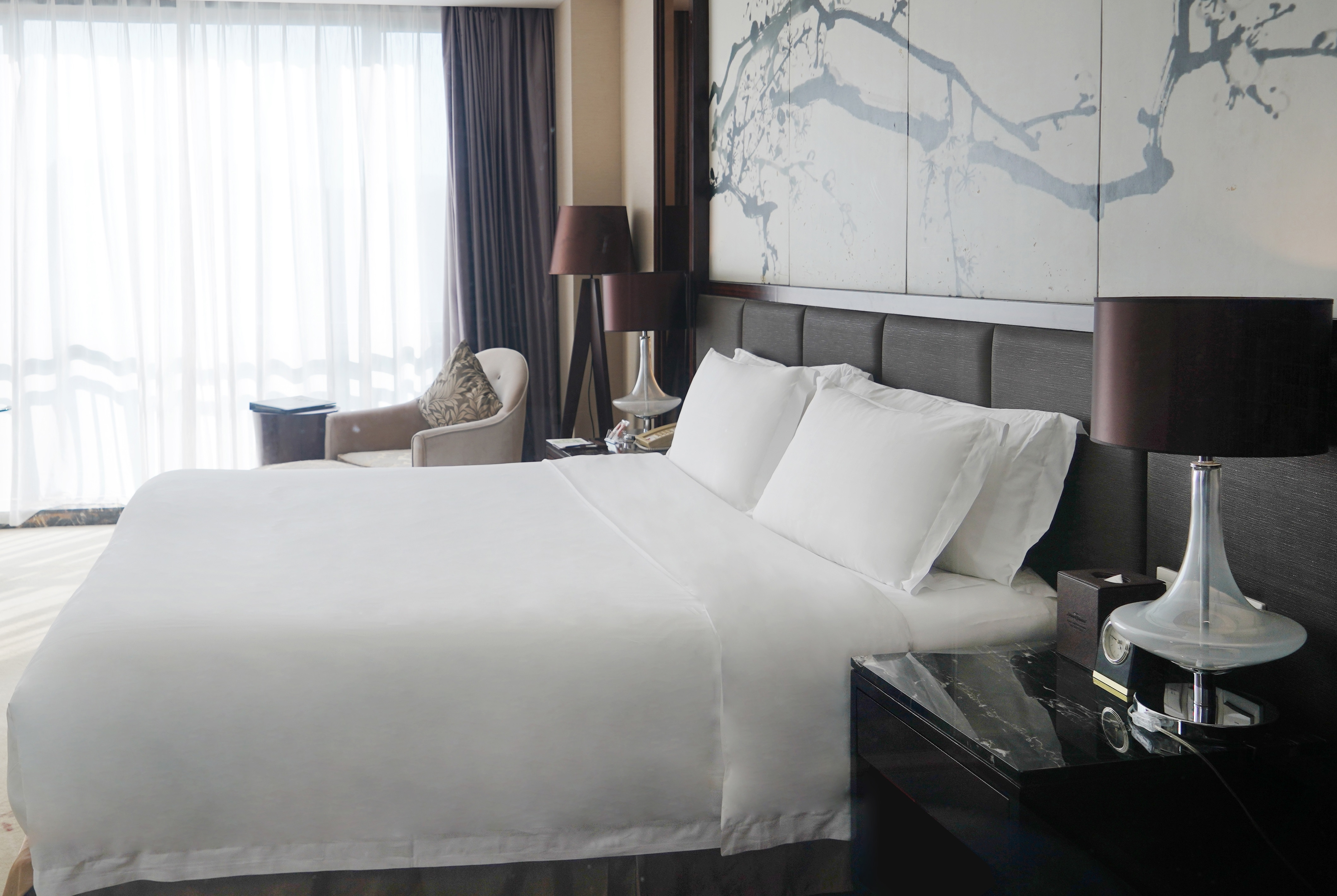 Guest room at the Howard Johnson by Wyndham Changsheng Plaza Meizhou in Meizhou, Other than US/Canada