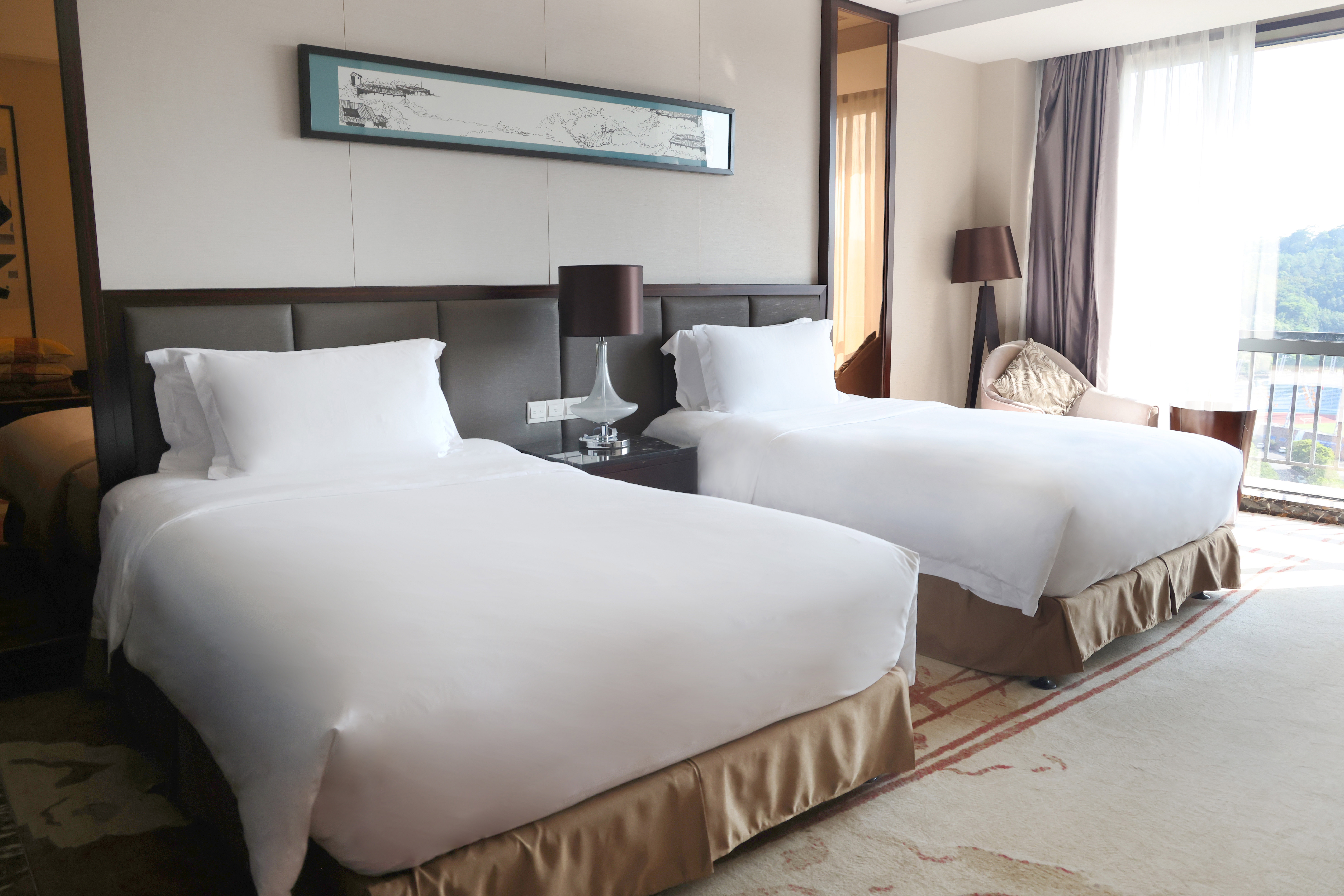 Guest room at the Howard Johnson by Wyndham Changsheng Plaza Meizhou in Meizhou, Other than US/Canada