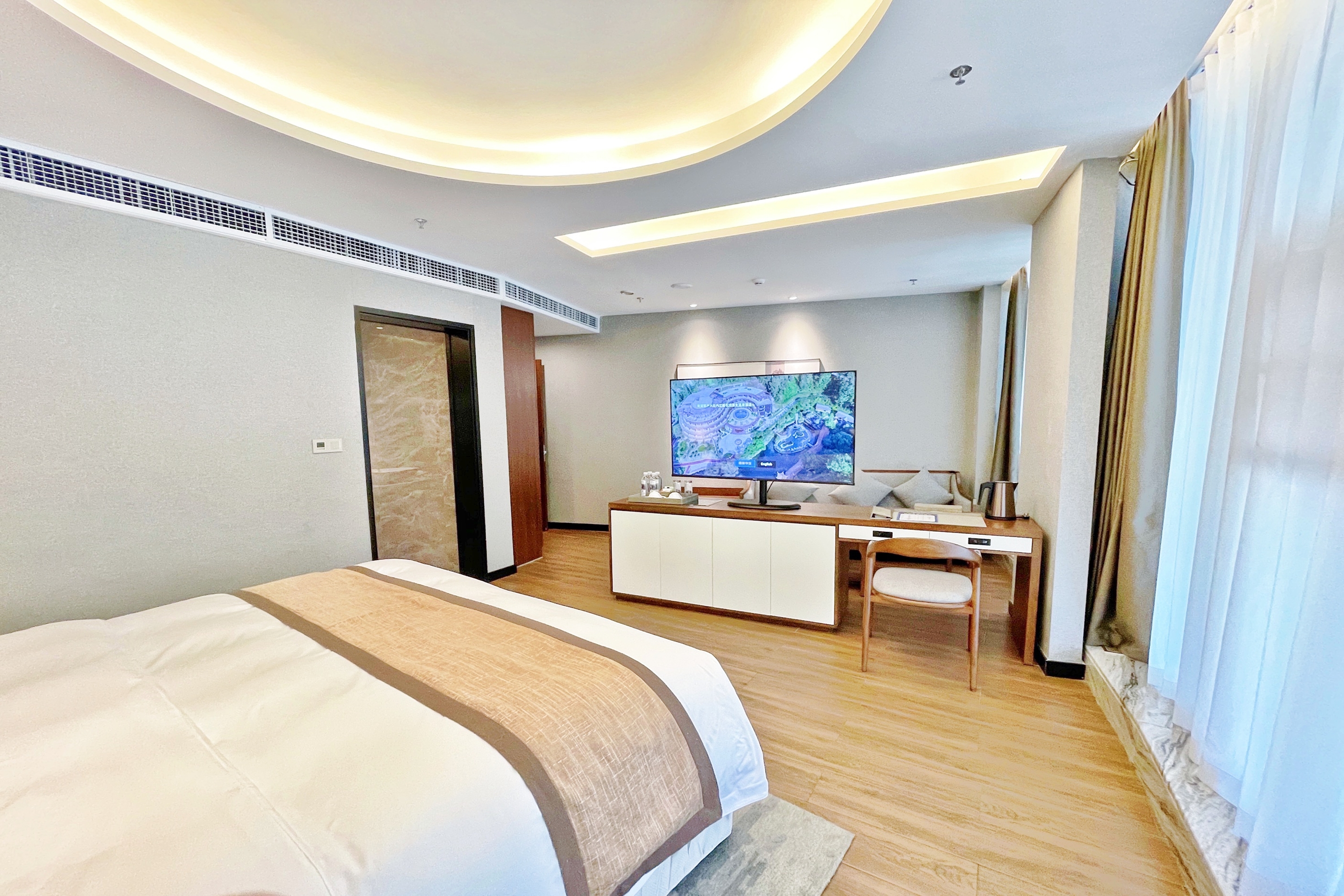 Guest room at the Howard Johnson by Wyndham Lake Serenity Hotel Neijiang in Neijiang City, Other than US/Canada