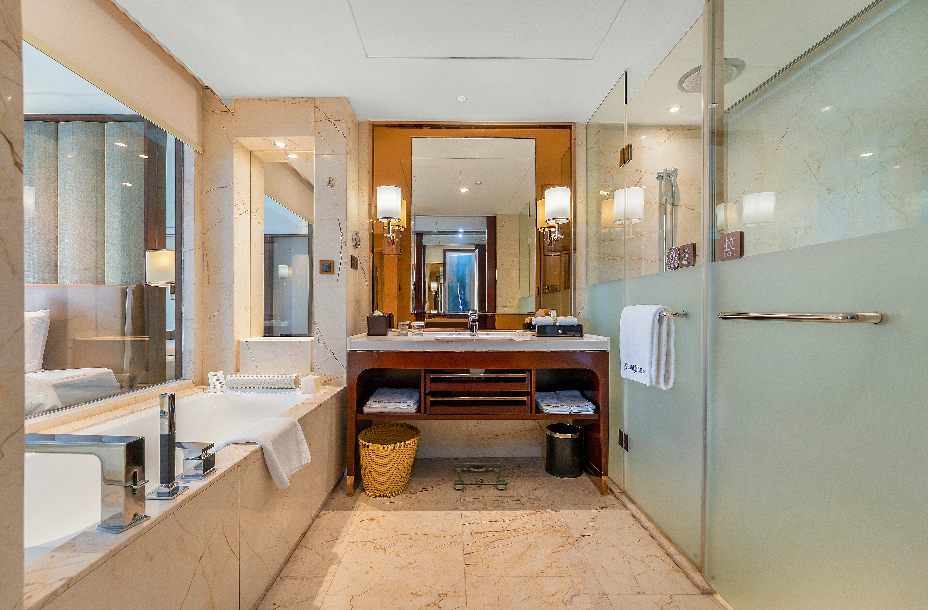 Guest room bath at the Howard Johnson by Wyndham Kangda Plaza Qingdao in Qingdao, Other than US/Canada