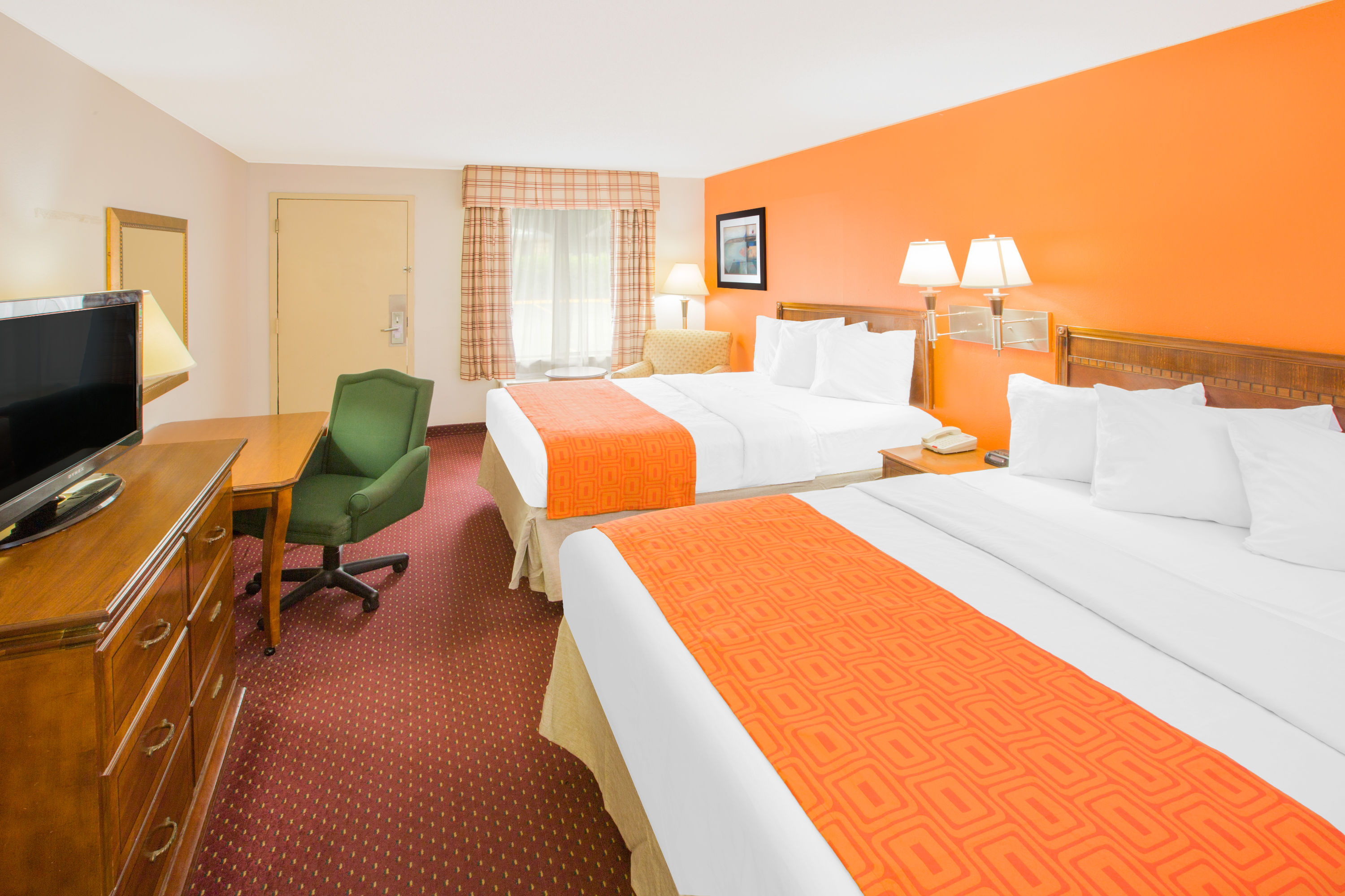 Guest room at the Howard Johnson by Wyndham Dothan in Dothan, Alabama