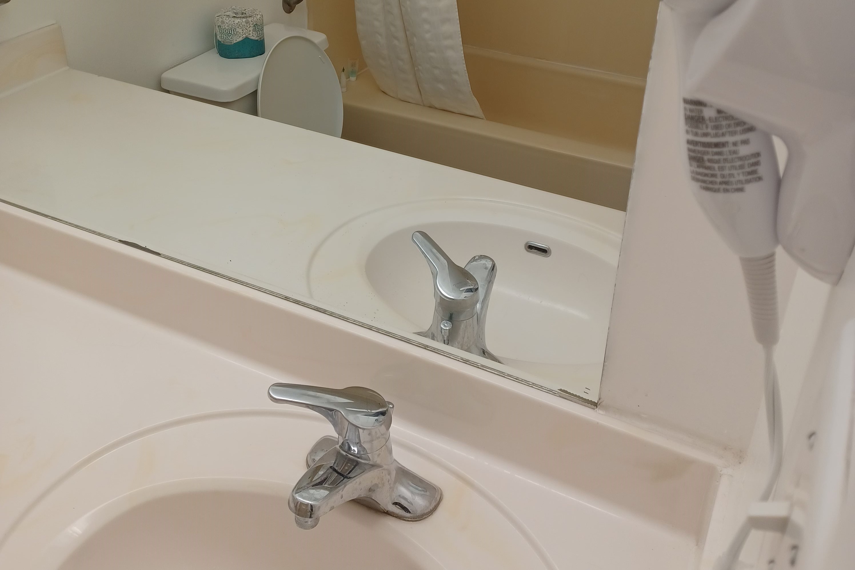 Guest room bath at the Howard Johnson by Wyndham Springerville in Springerville, Arizona