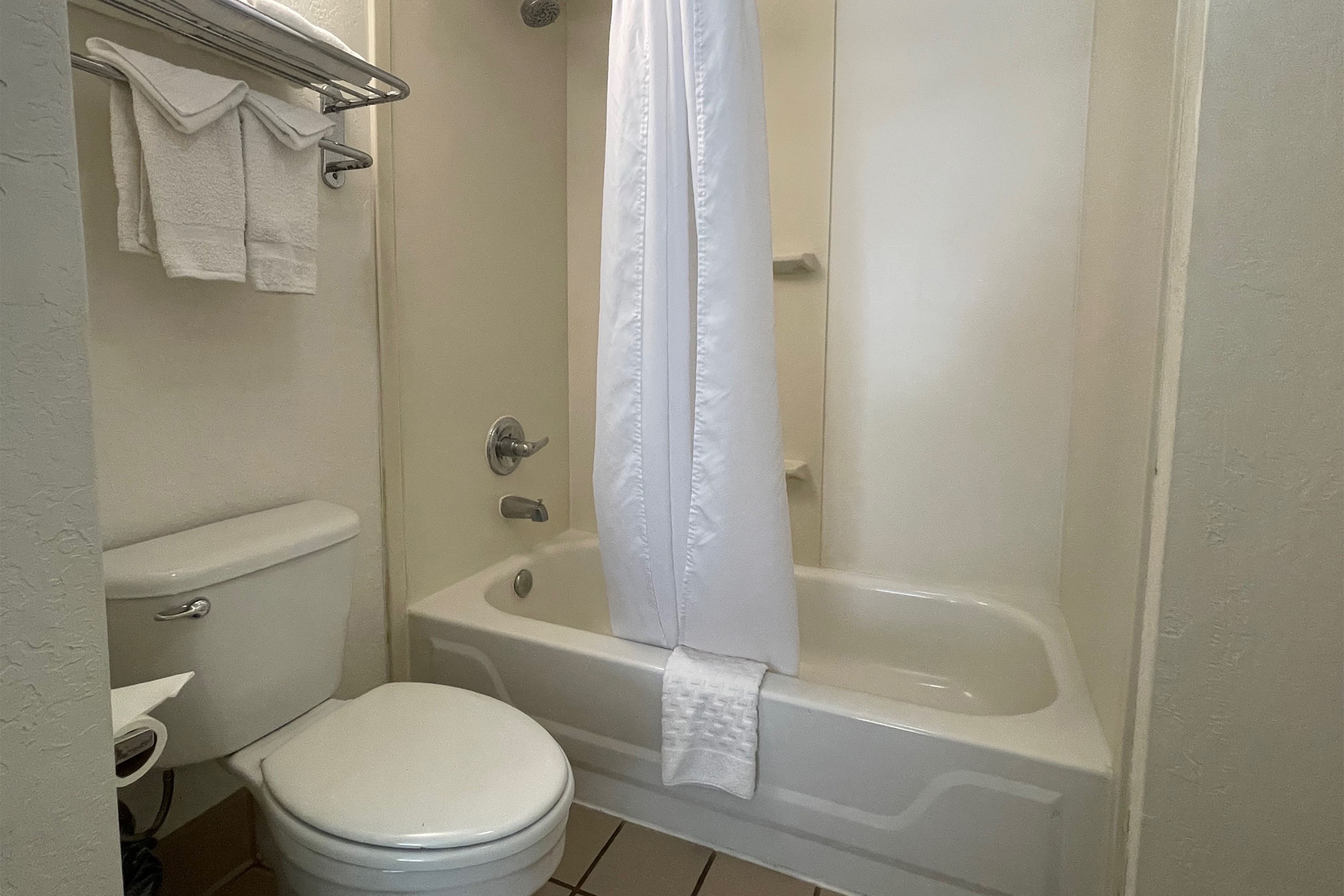 Guest room bath at the Howard Johnson by Wyndham Tempe University/Phoenix in Tempe, Arizona