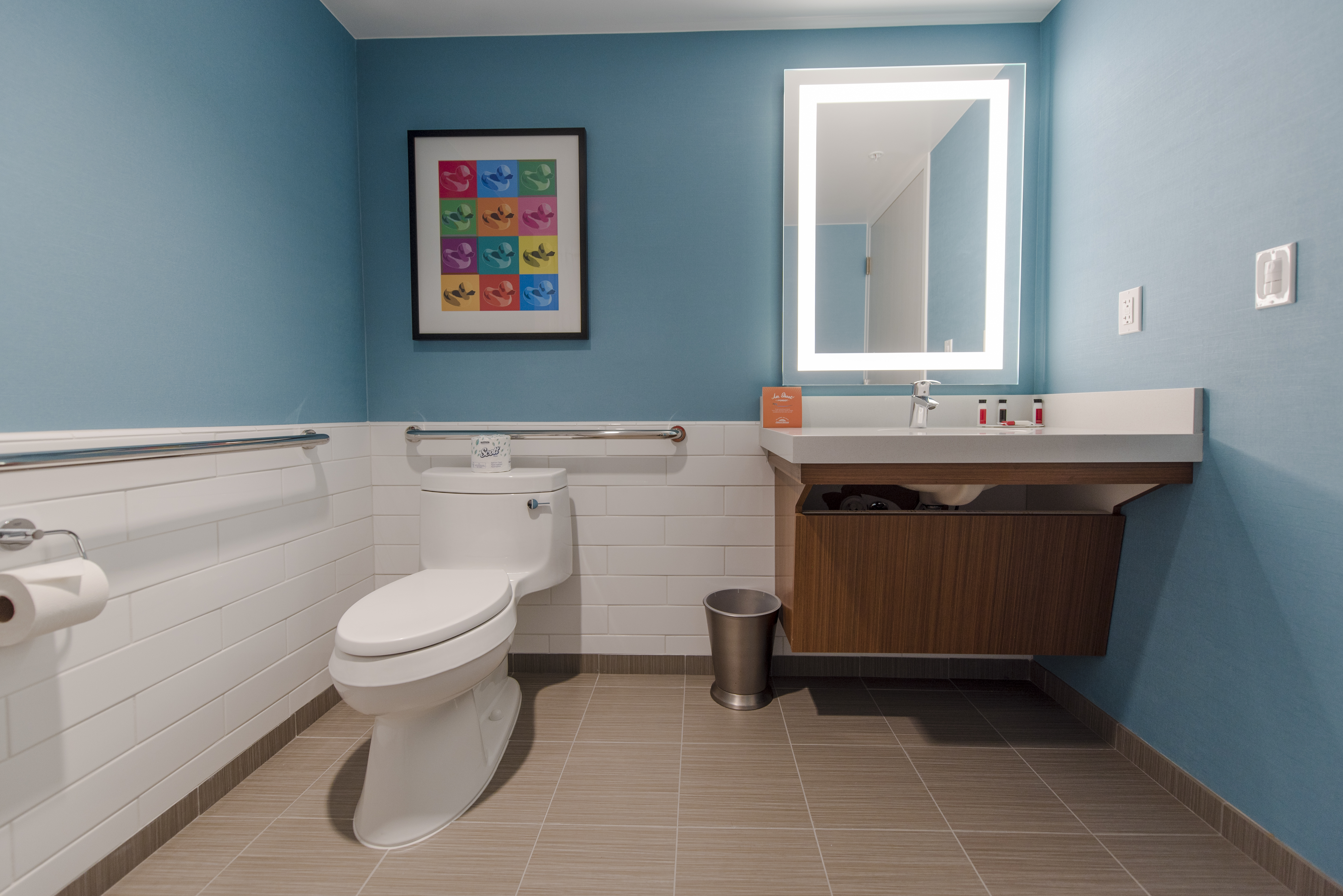 Guest room bath at the Howard Johnson by Wyndham Anaheim Hotel & Water Playground in Anaheim, California