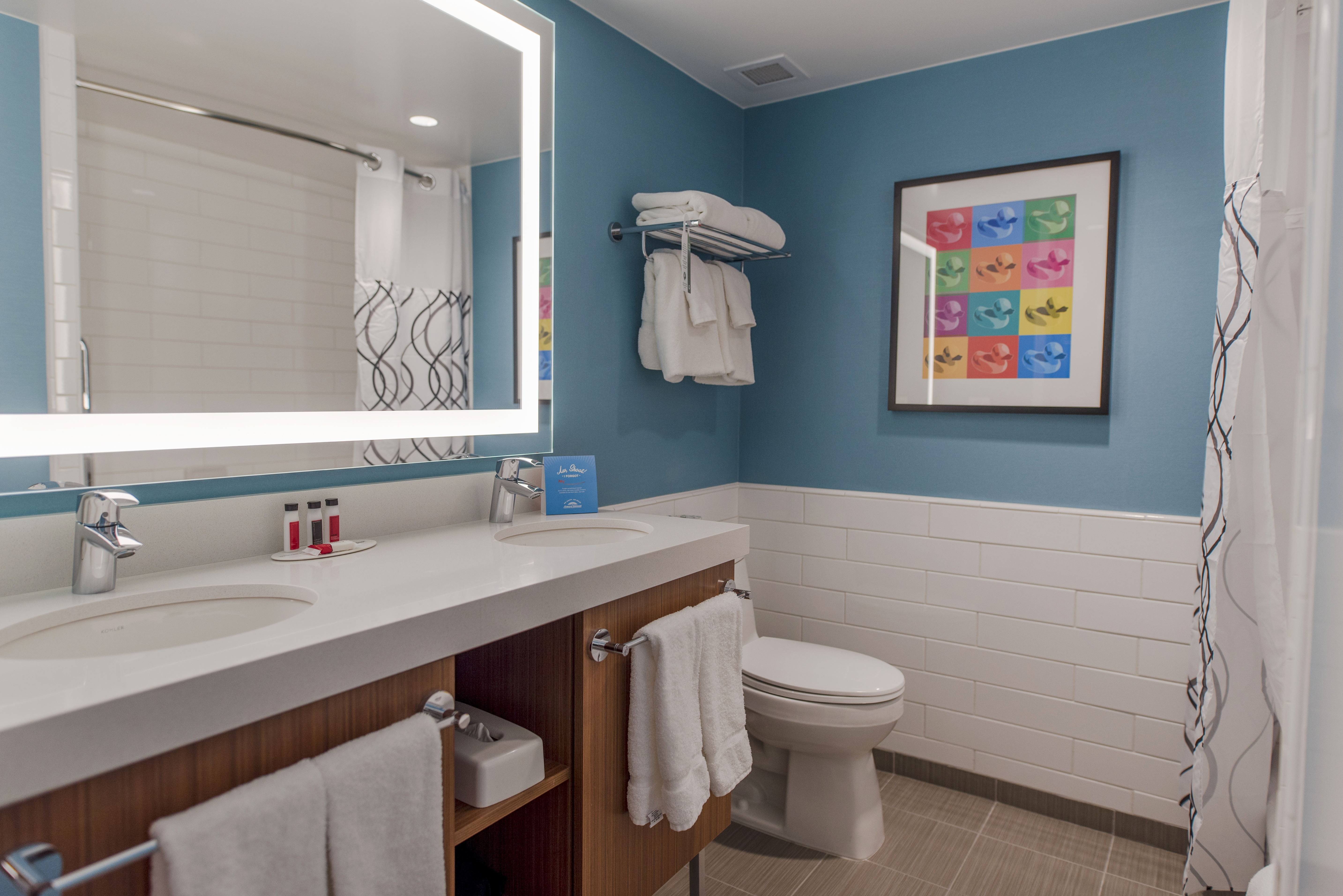 Guest room bath at the Howard Johnson by Wyndham Anaheim Hotel & Water Playground in Anaheim, California