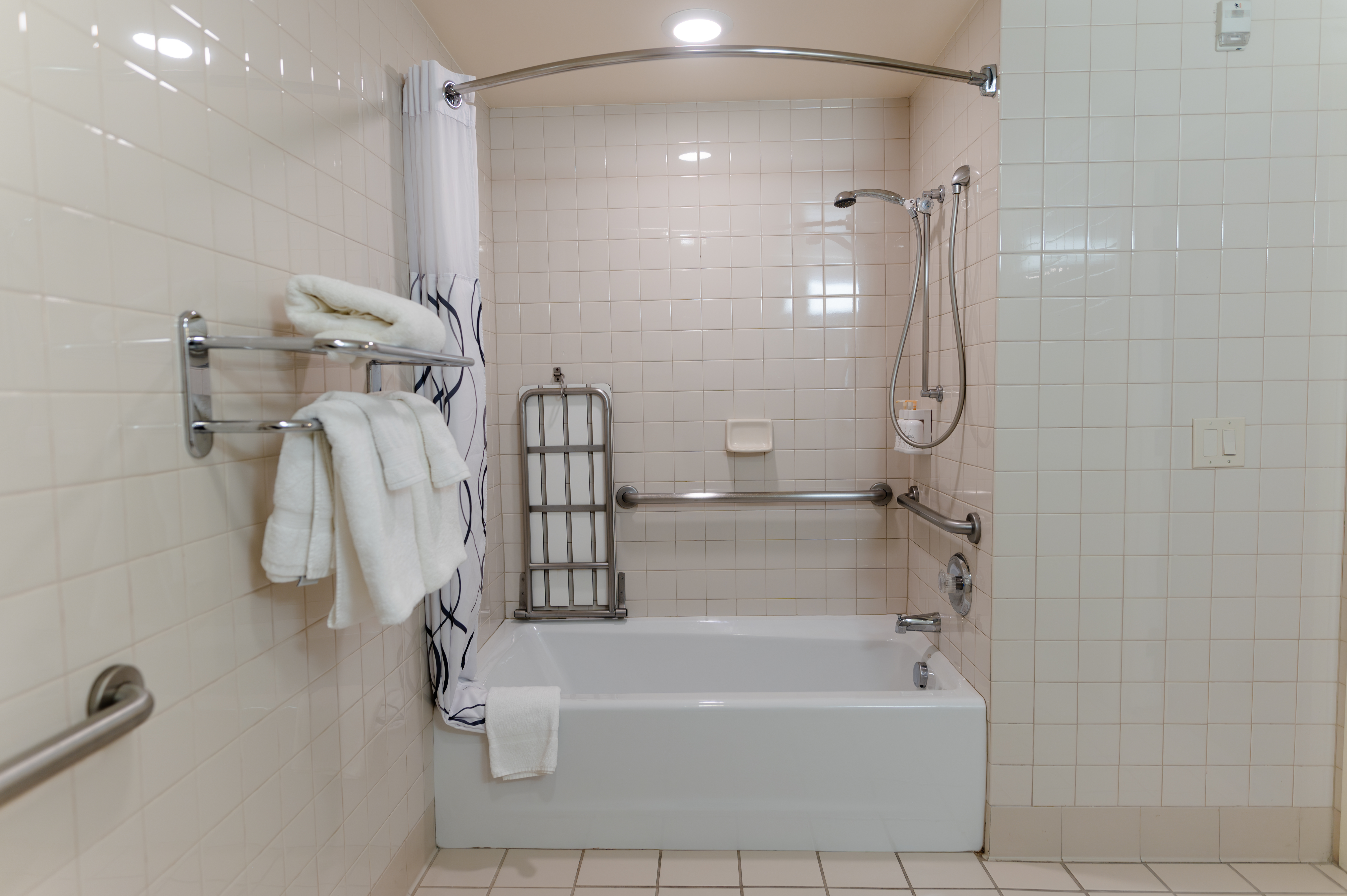 Guest room bath at the Howard Johnson by Wyndham Anaheim Hotel & Water Playground in Anaheim, California
