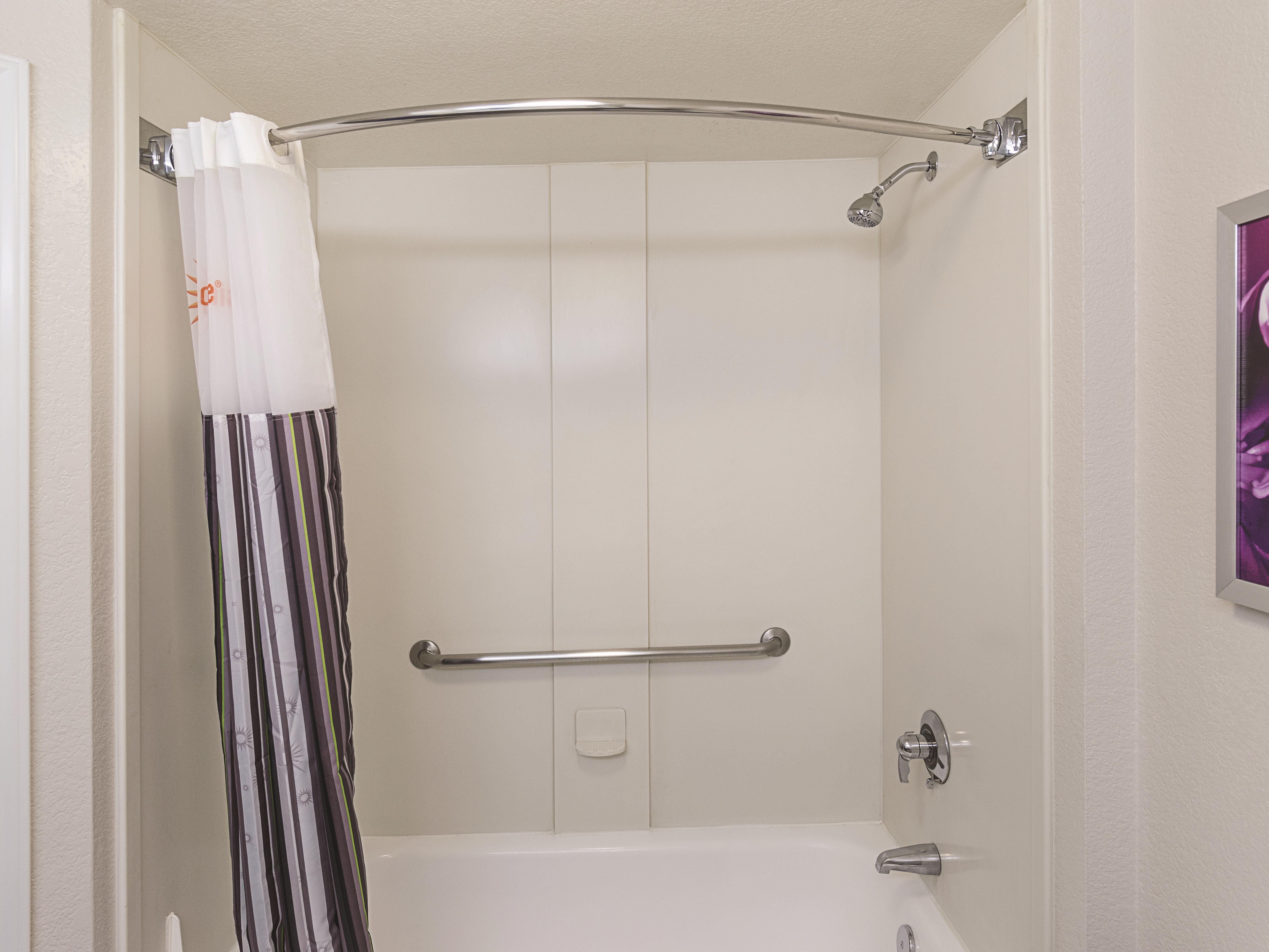 Guest room bath at the Howard Johnson by Wyndham Sacramento Downtown in Sacramento, California