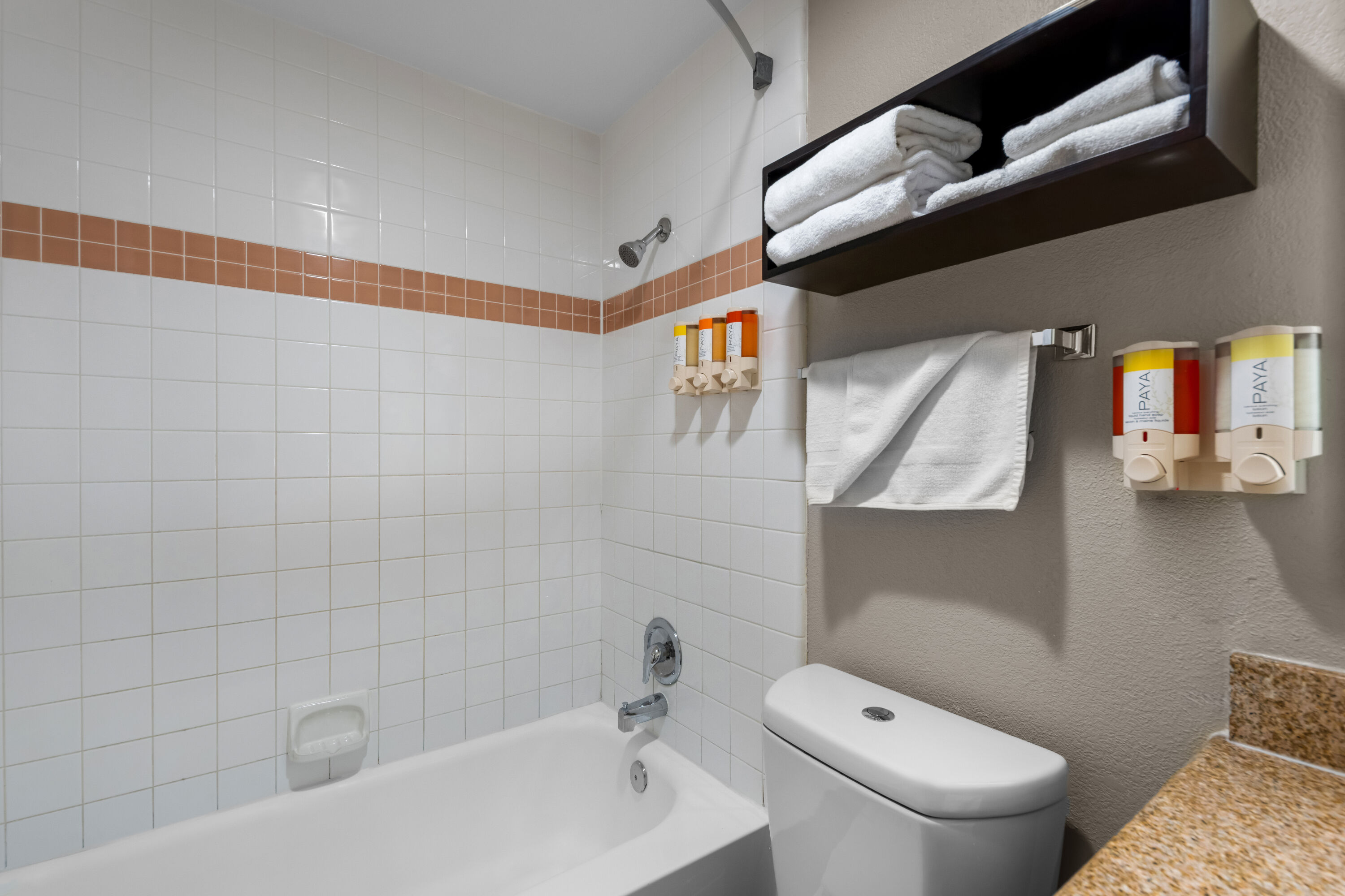 Guest room bath at the Howard Johnson by Wyndham Santa Cruz in Santa Cruz, California