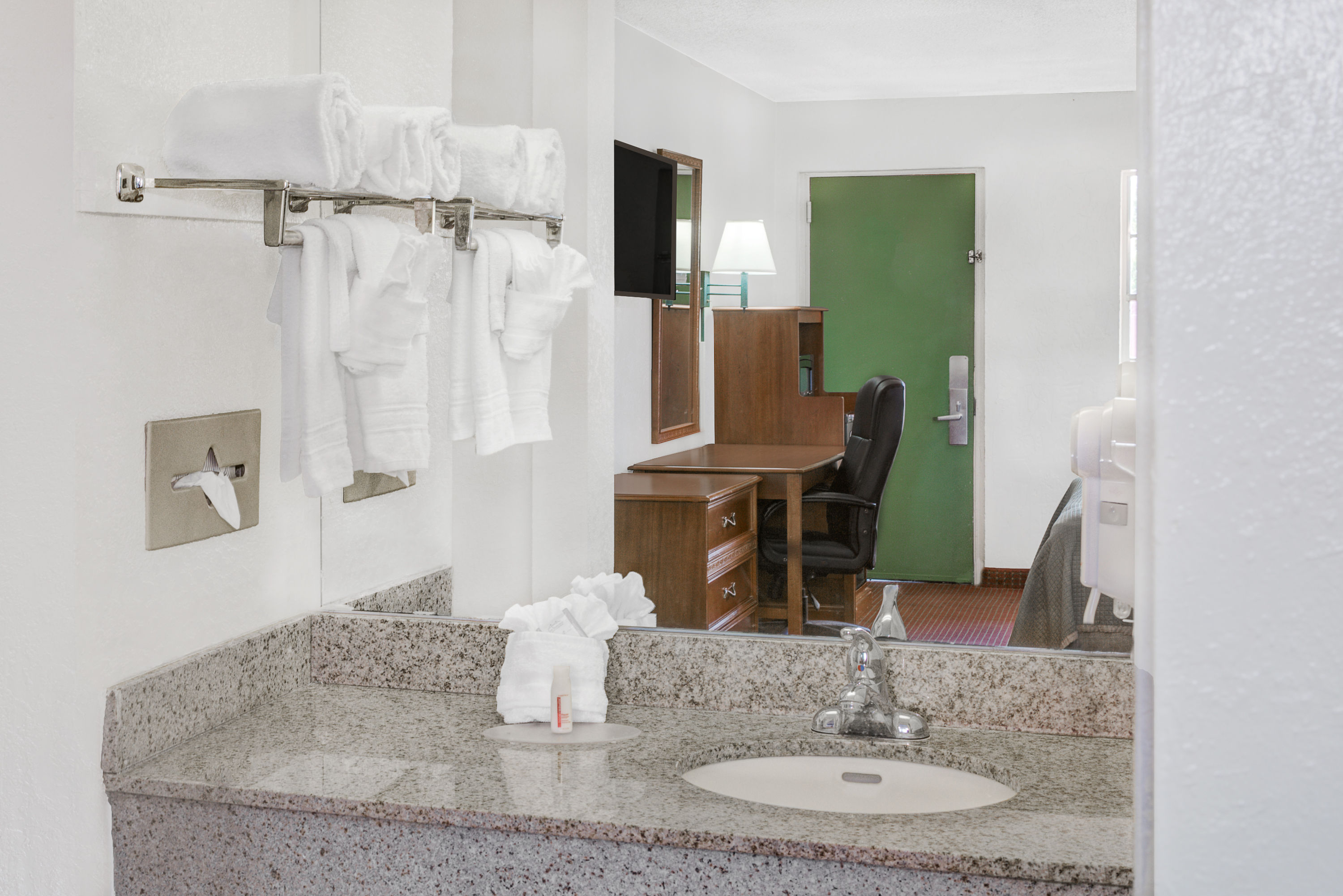 Guest room bath at the Howard Johnson by Wyndham Ft. Myers FL in Fort Myers, Florida