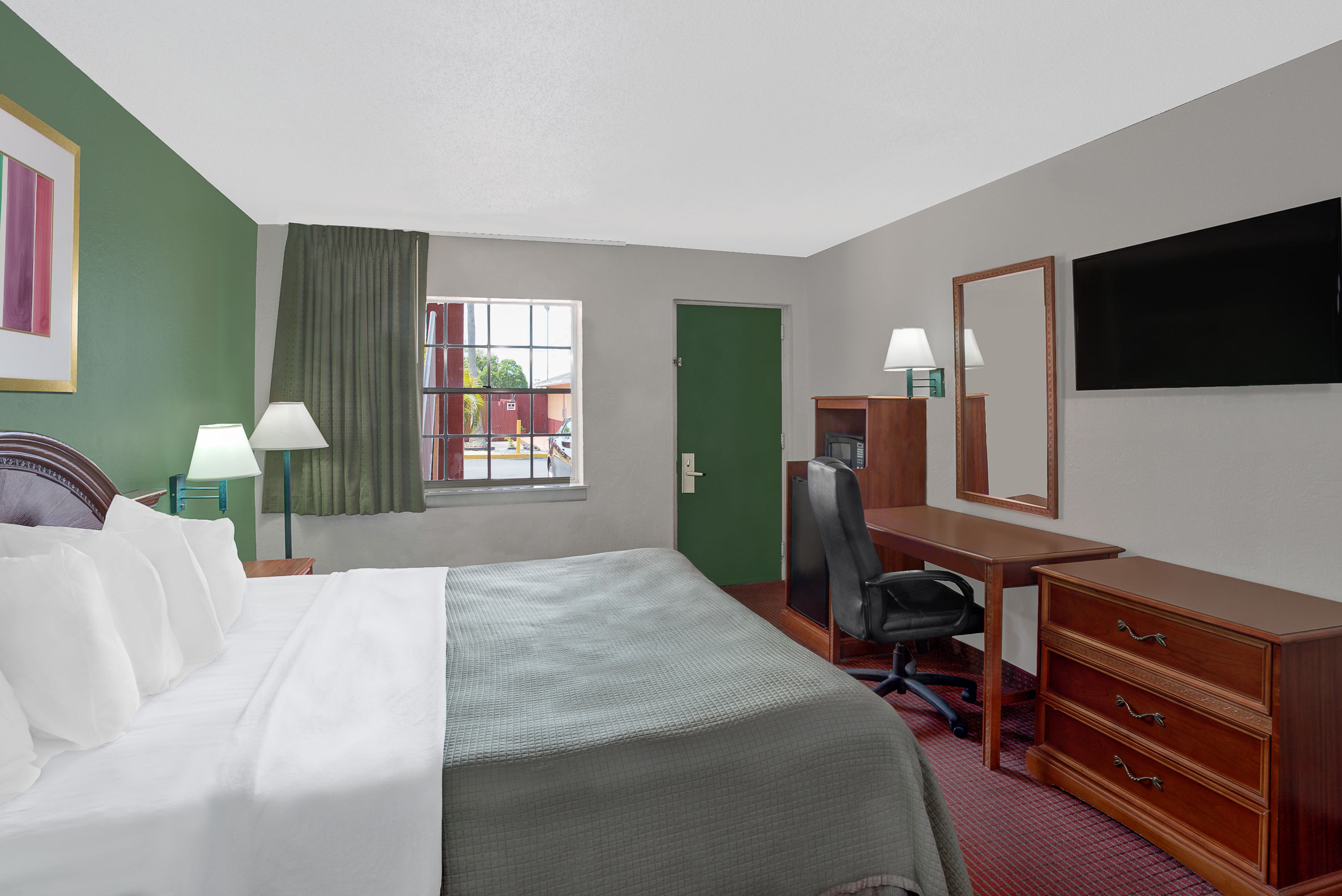 Guest room at the Howard Johnson by Wyndham Ft. Myers FL in Fort Myers, Florida