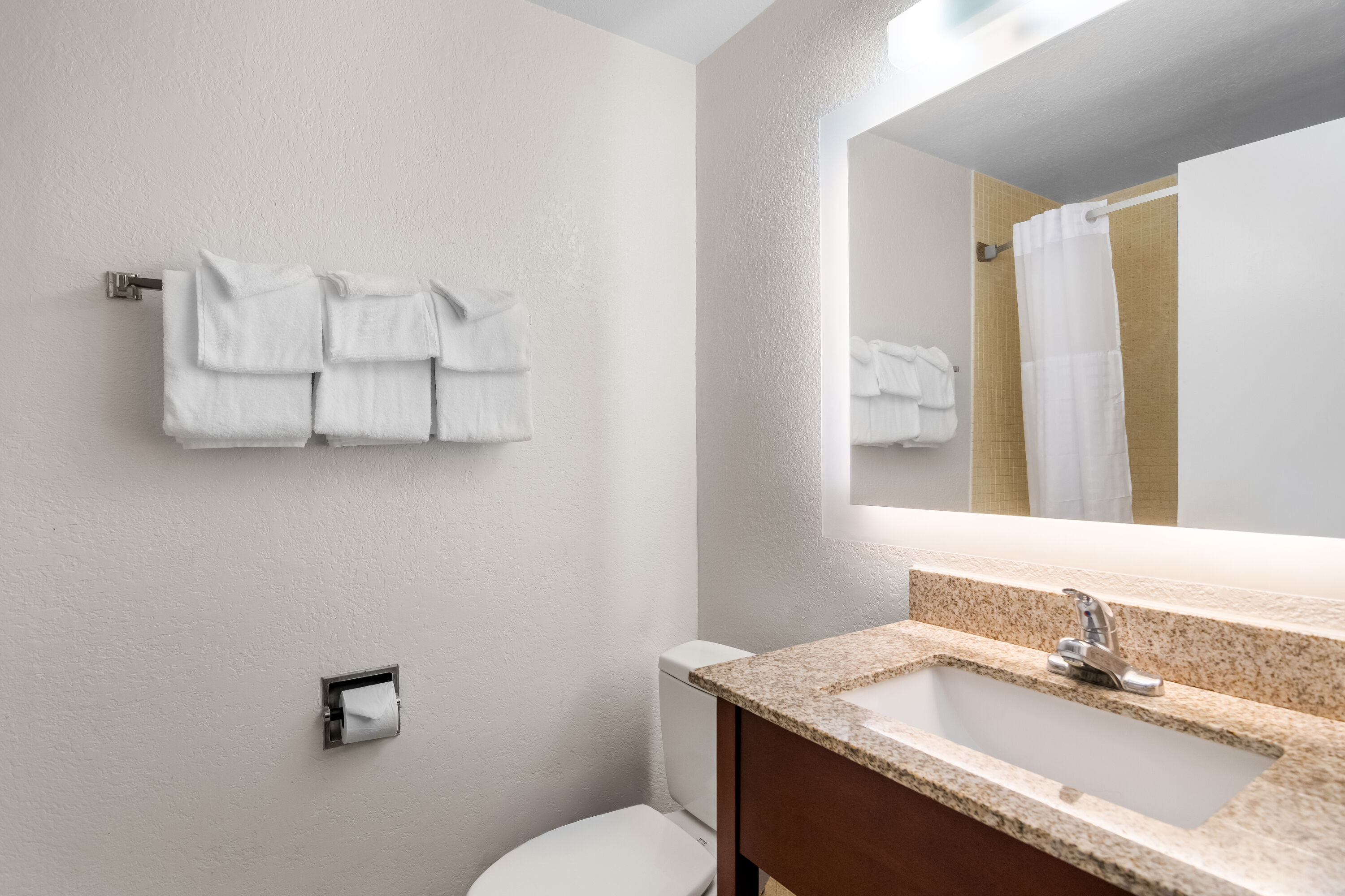 Guest room bath at the Howard Johnson by Wyndham Vero Beach / Downtown in Vero Beach, Florida
