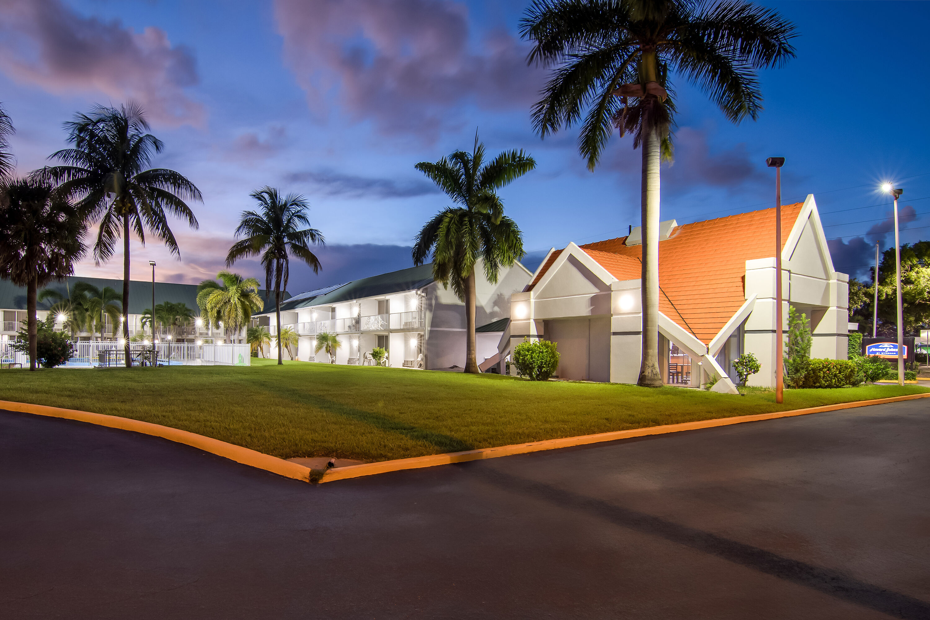 Exterior Night Image of Howard Johnson by Wyndham Vero Beach / Downtown hotel in Vero Beach, Florida