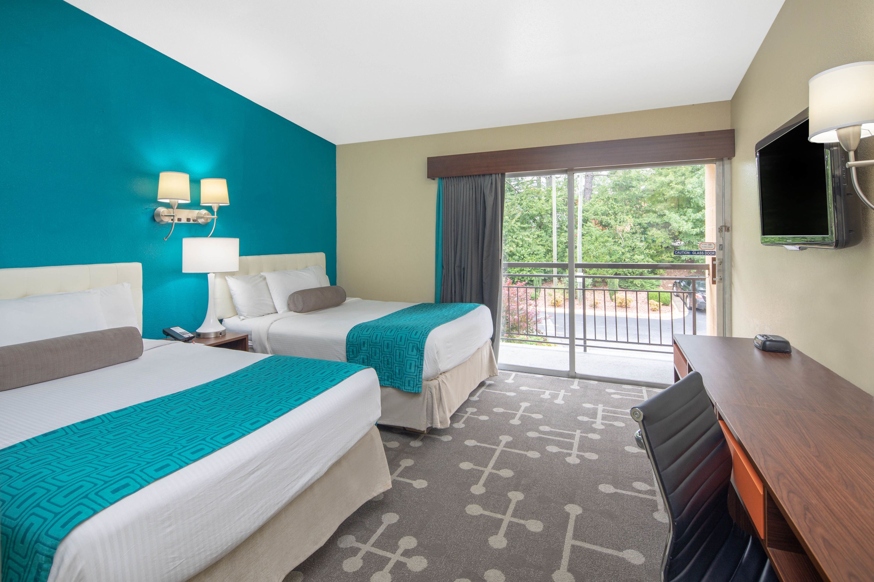 Guest room at the Howard Johnson by Wyndham Athens in Athens, Georgia