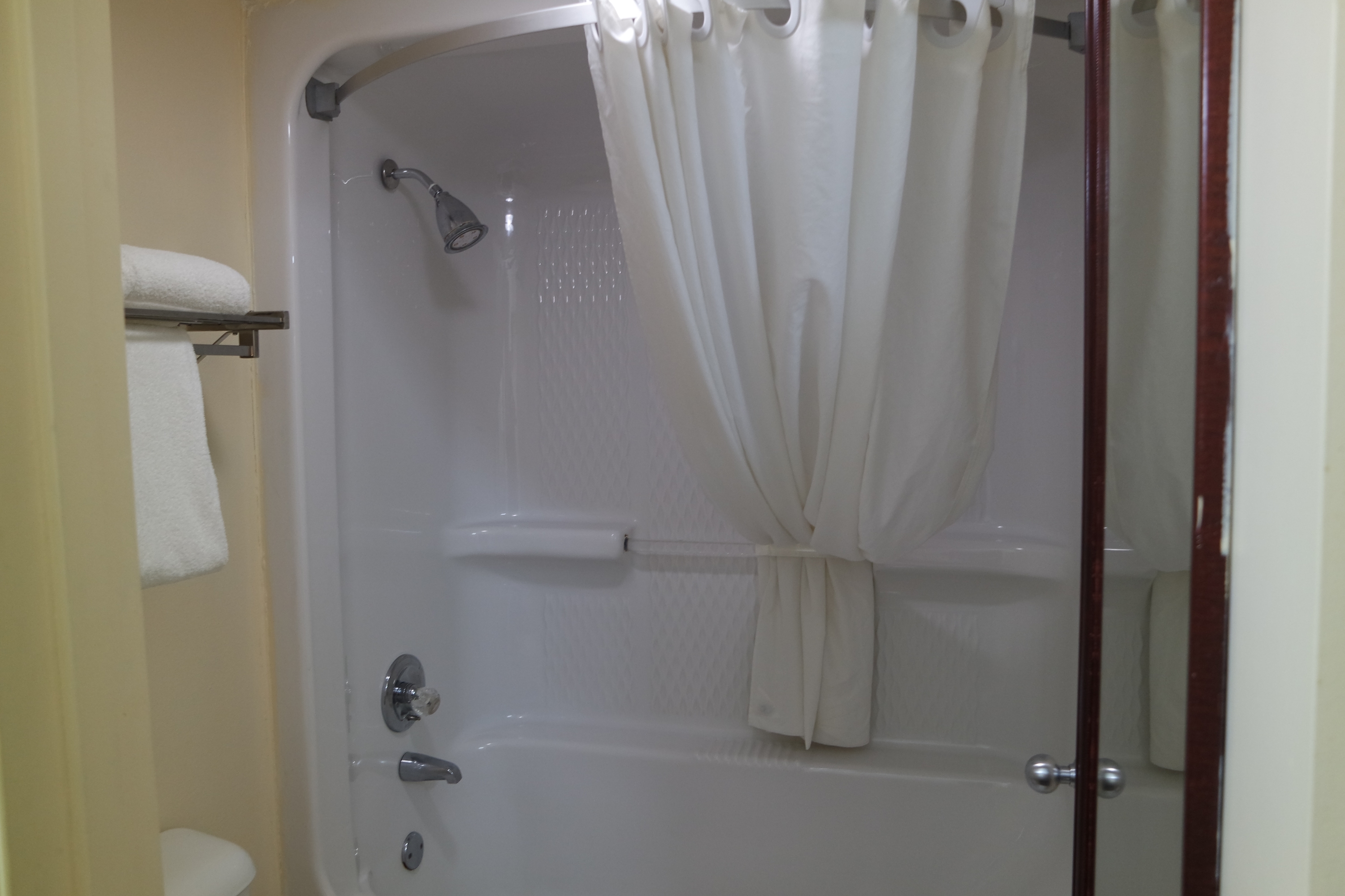 Guest room bath at the Howard Johnson by Wyndham Perry GA in Perry, Georgia