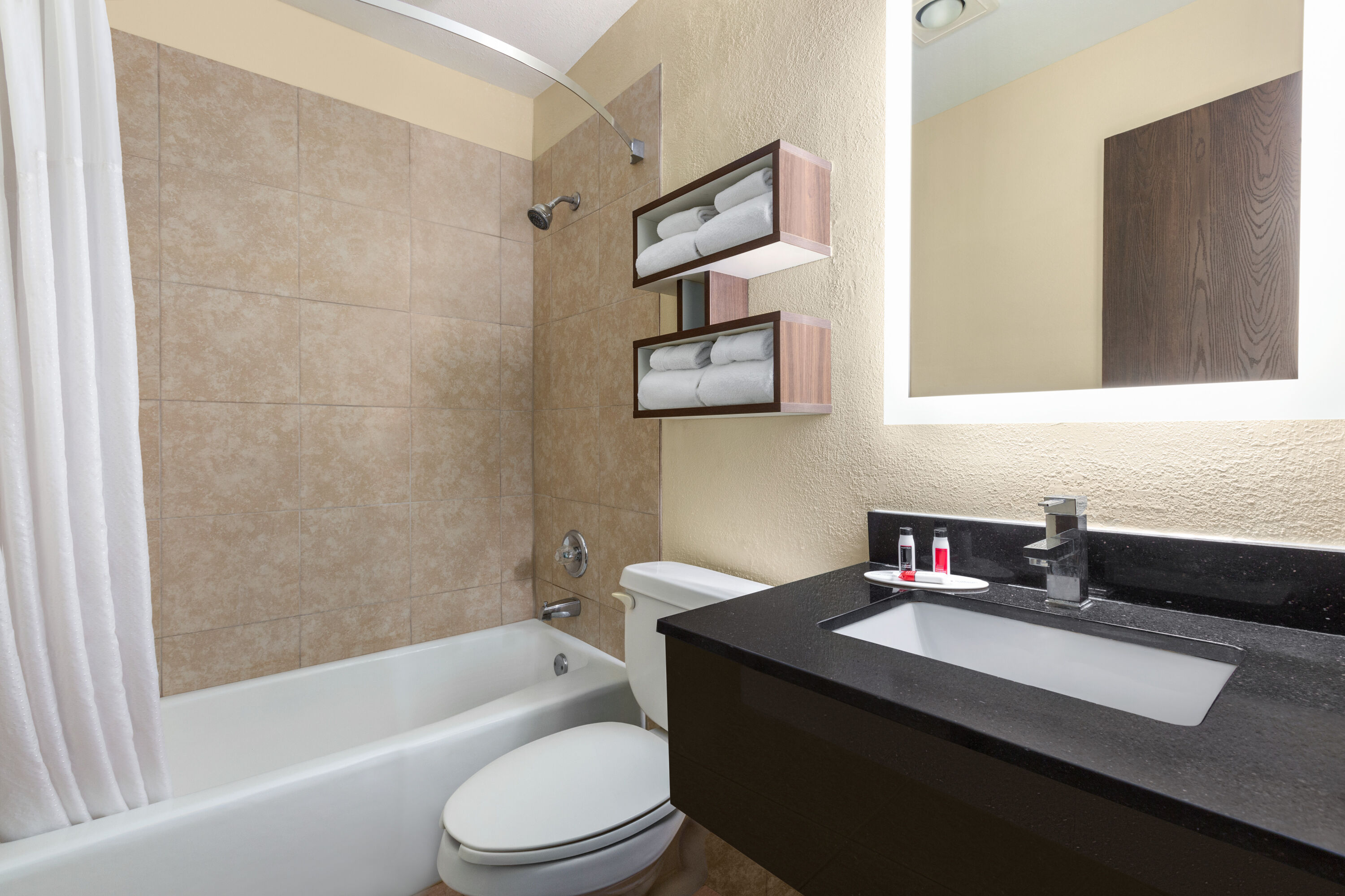 Guest room bath at the Howard Johnson by Wyndham Waterloo/Cedar Falls in Waterloo, Iowa