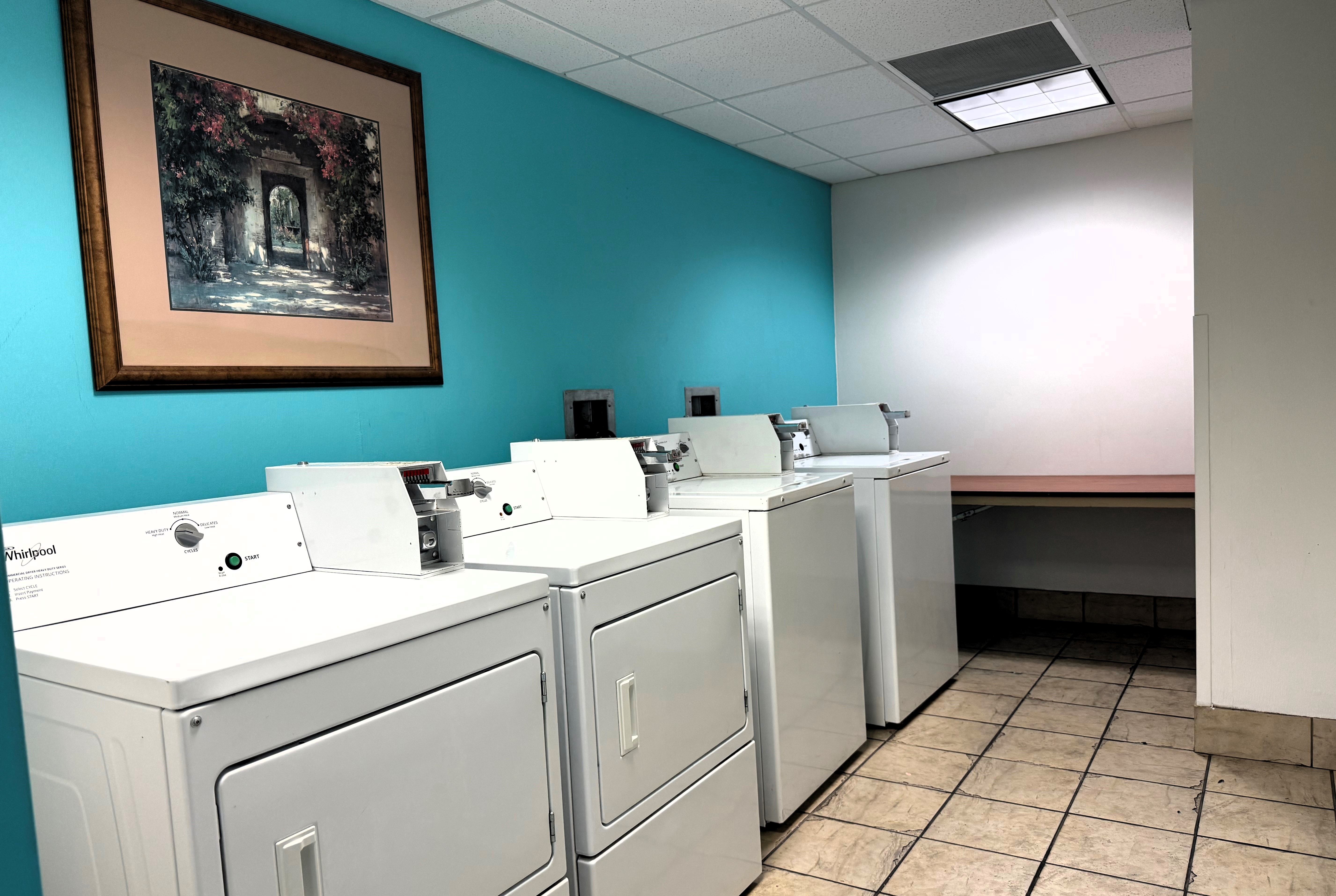 Laundry facilities at Howard Johnson by Wyndham Evansville East in Evansville, Indiana