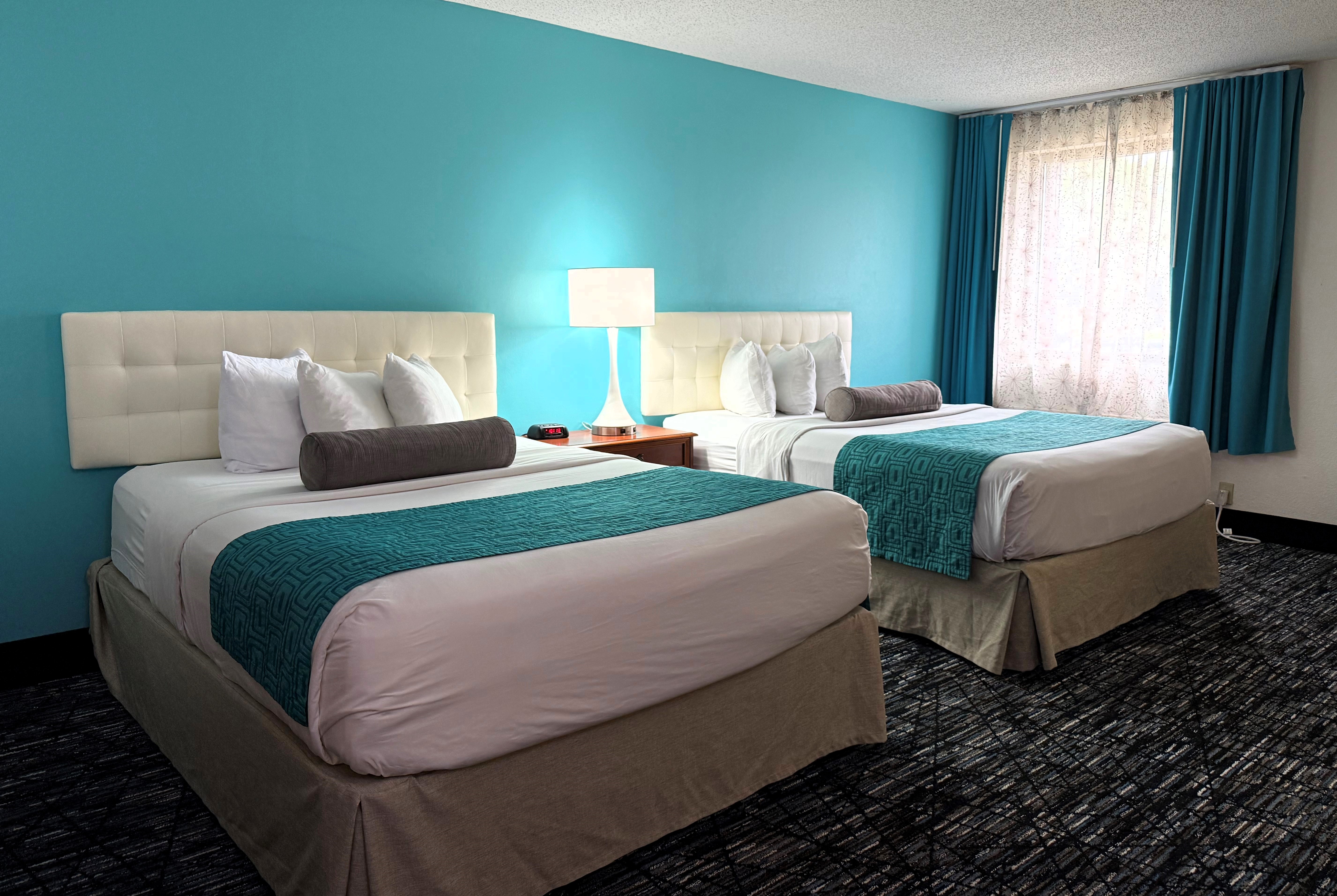 Guest room at the Howard Johnson by Wyndham Evansville East in Evansville, Indiana