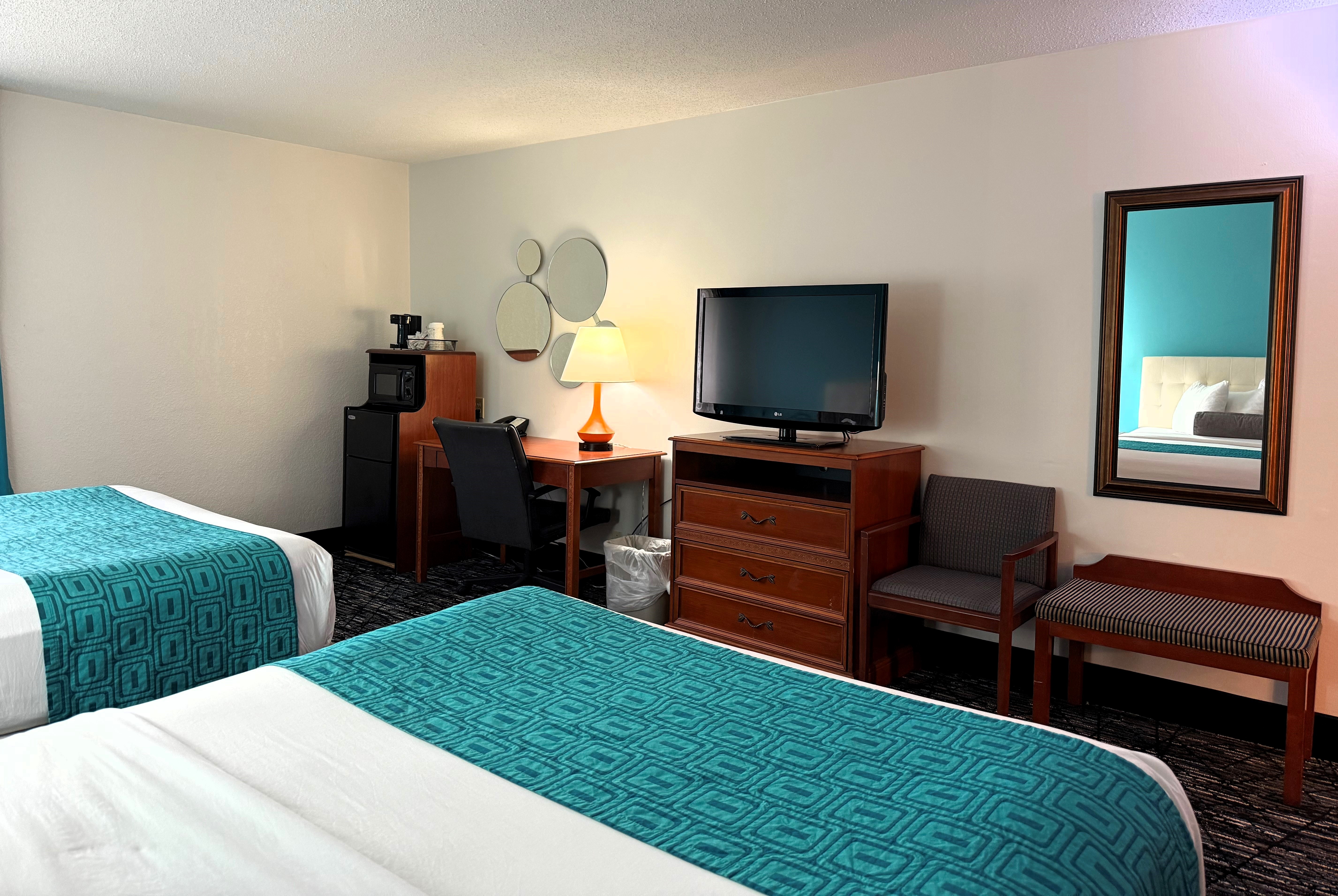 Guest room at the Howard Johnson by Wyndham Evansville East in Evansville, Indiana
