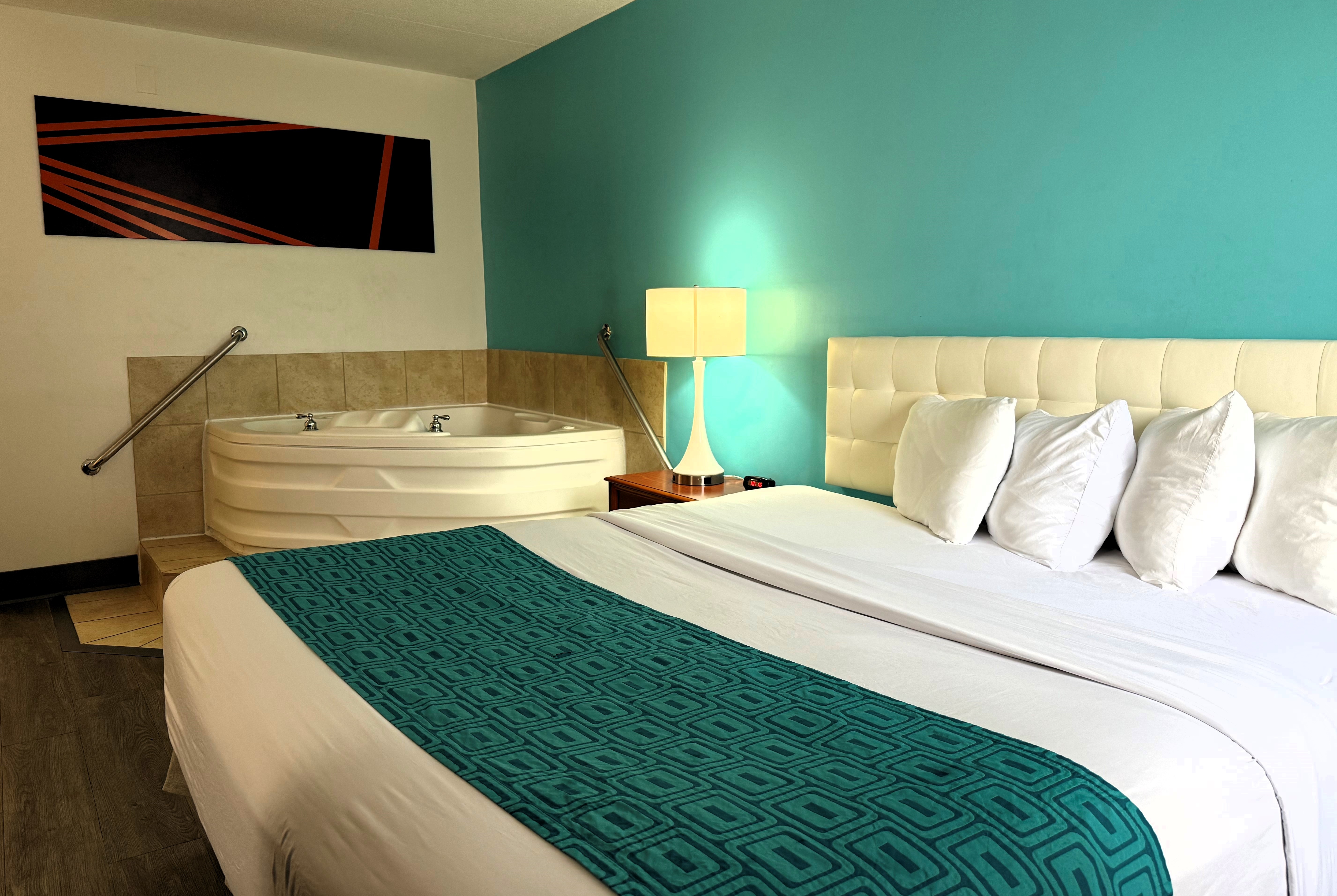 Guest room at the Howard Johnson by Wyndham Evansville East in Evansville, Indiana