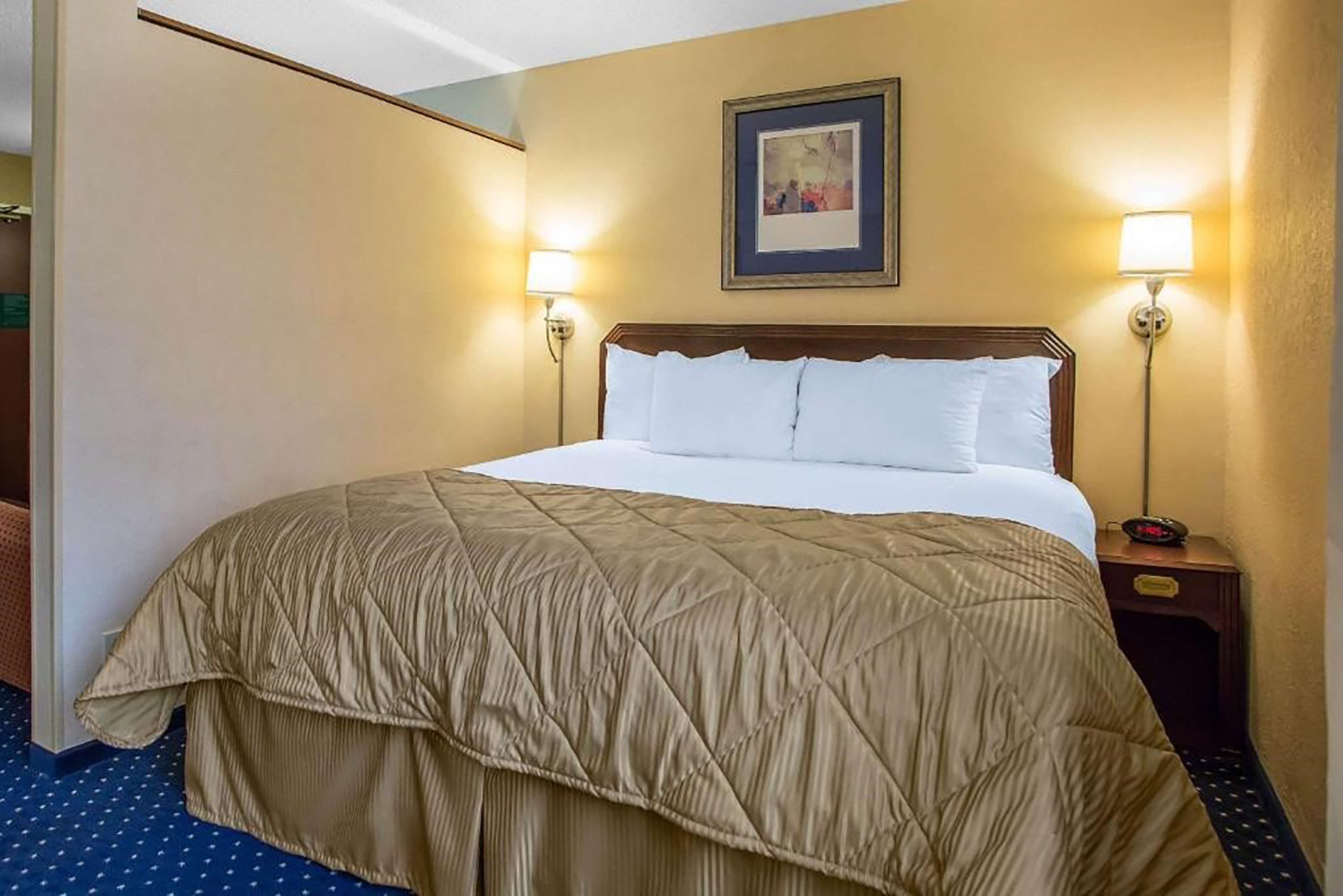 Guest room at the Howard Johnson by Wyndham Merrillville in Merrillville, Indiana