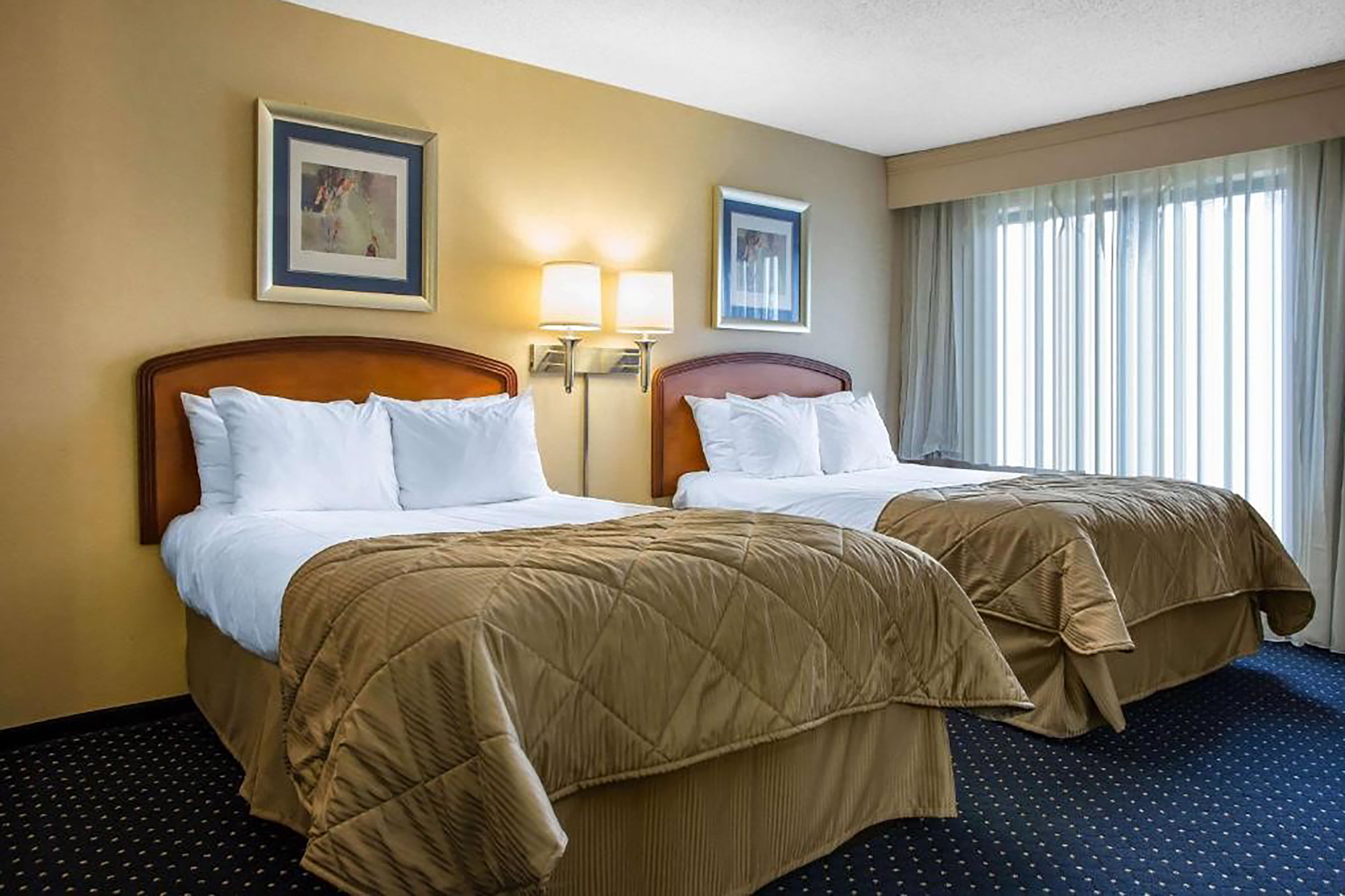 Guest room at the Howard Johnson by Wyndham Merrillville in Merrillville, Indiana