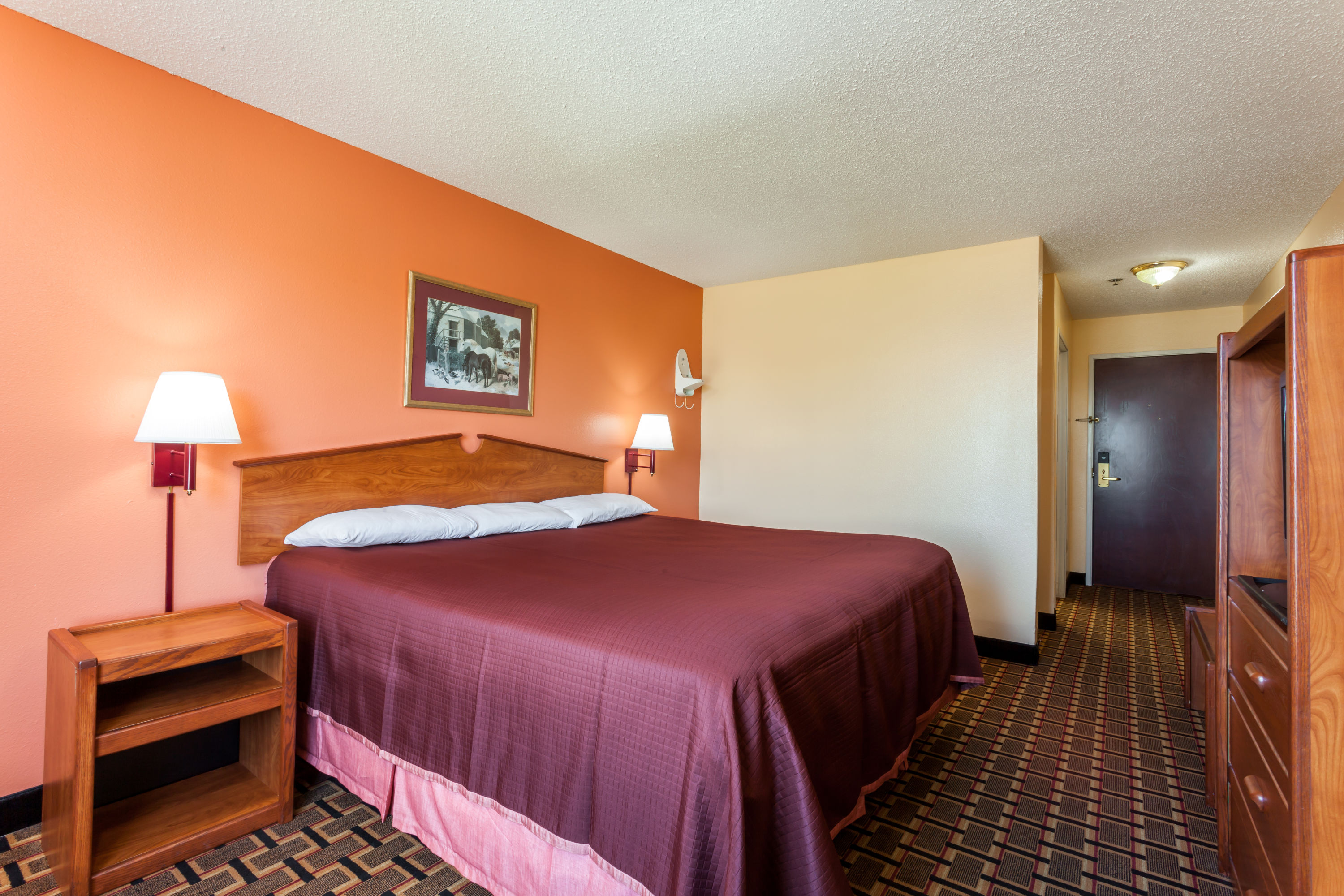 Guest room at the Howard Johnson by Wyndham Airport in Louisville, Kentucky