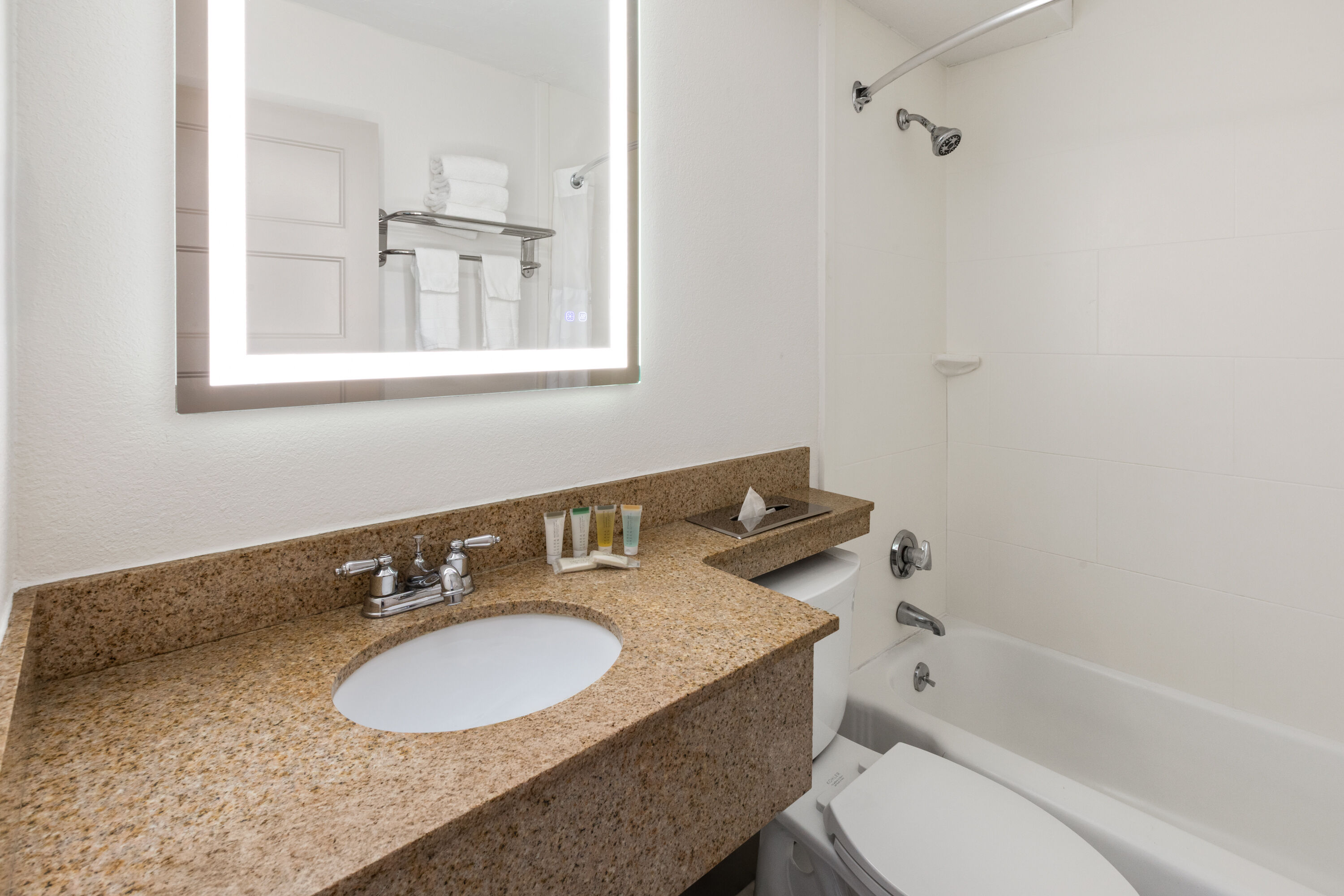 Guest room bath at the Howard Johnson by Wyndham Malden Boston Area in Malden, Massachusetts