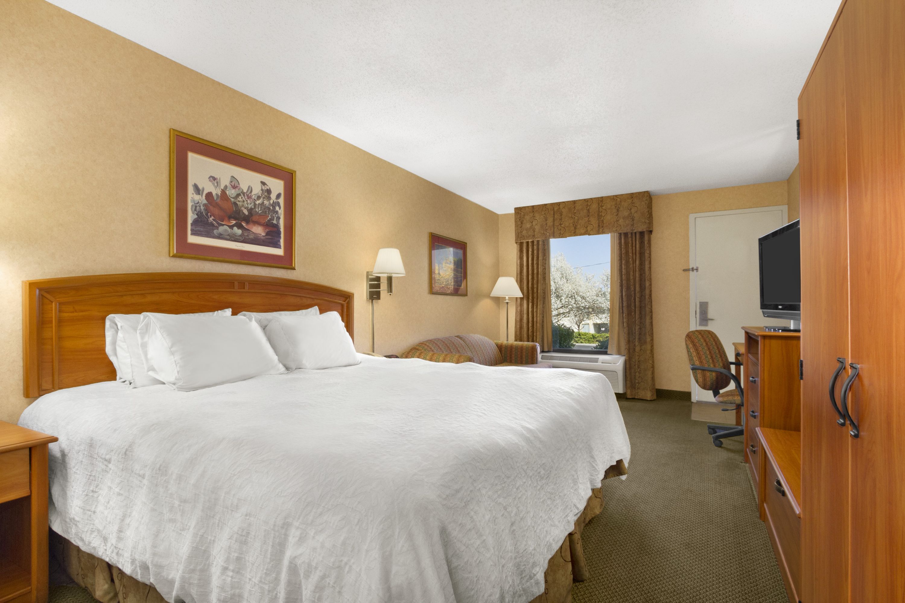 Guest room at the Howard Johnson by Wyndham Greensboro Near the Coliseum in Greensboro, North Carolina