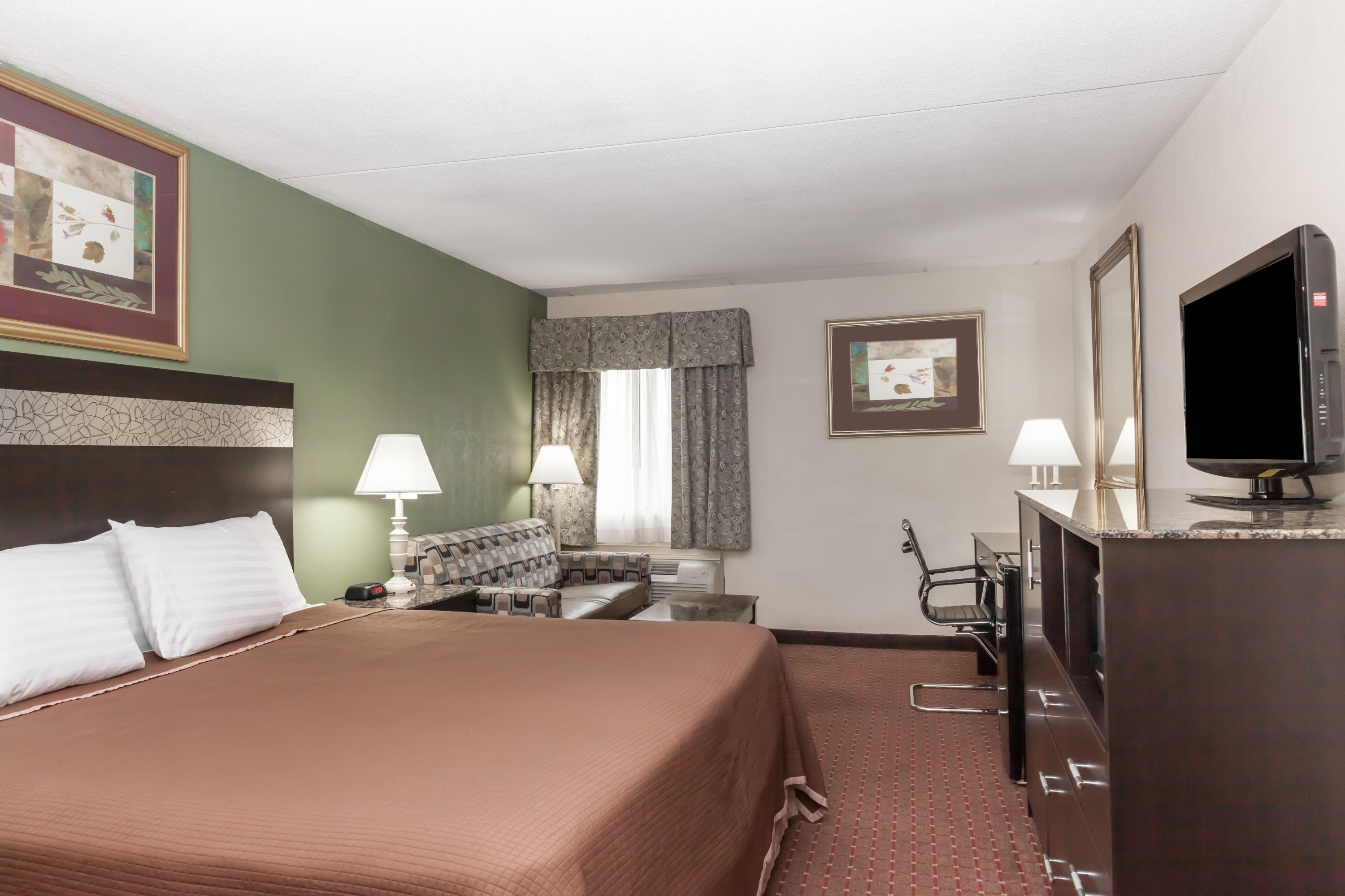 Guest room at the Howard Johnson by Wyndham Newark Airport in Newark, New Jersey