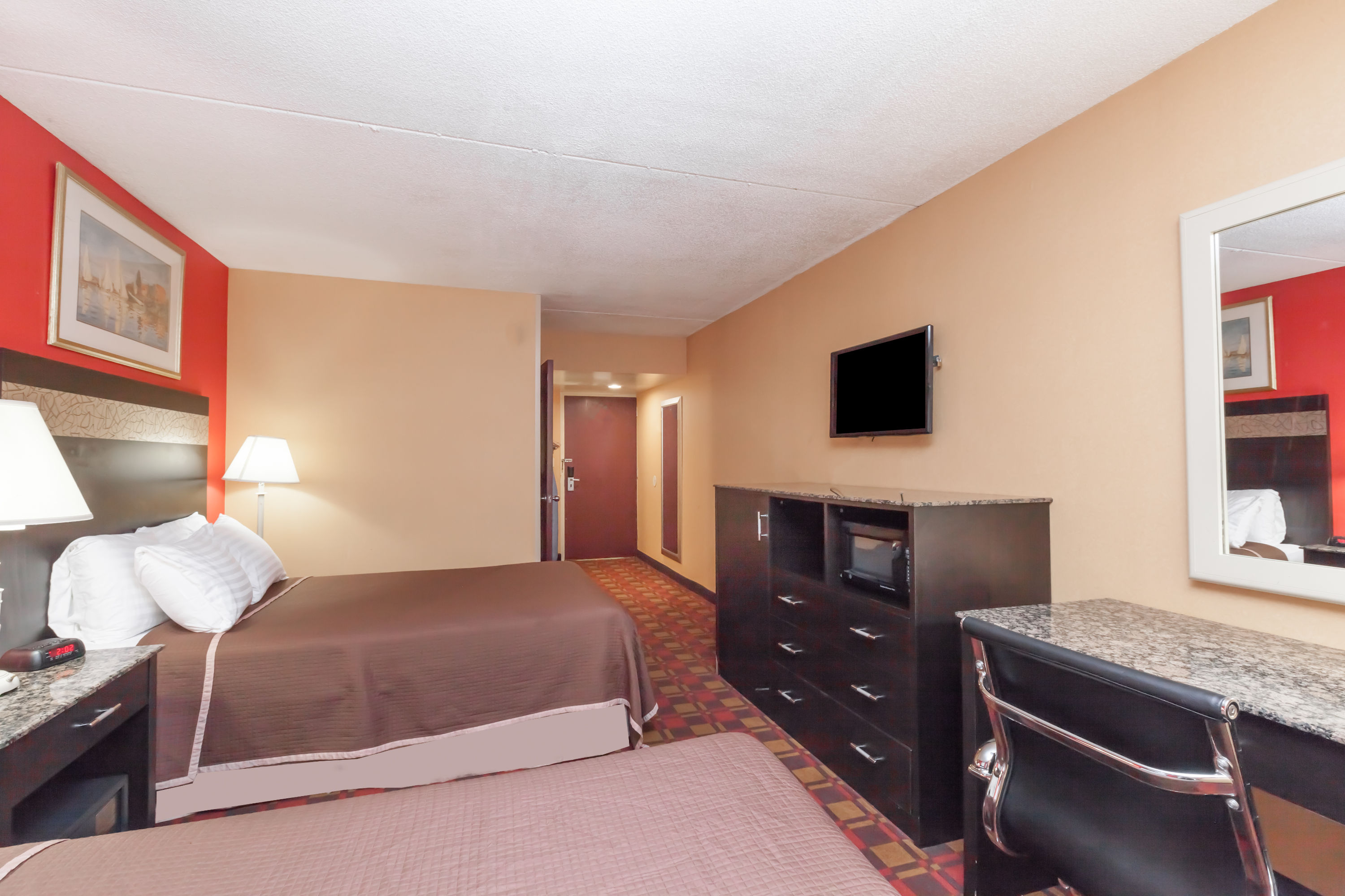 Guest room at the Howard Johnson by Wyndham Newark Airport in Newark, New Jersey