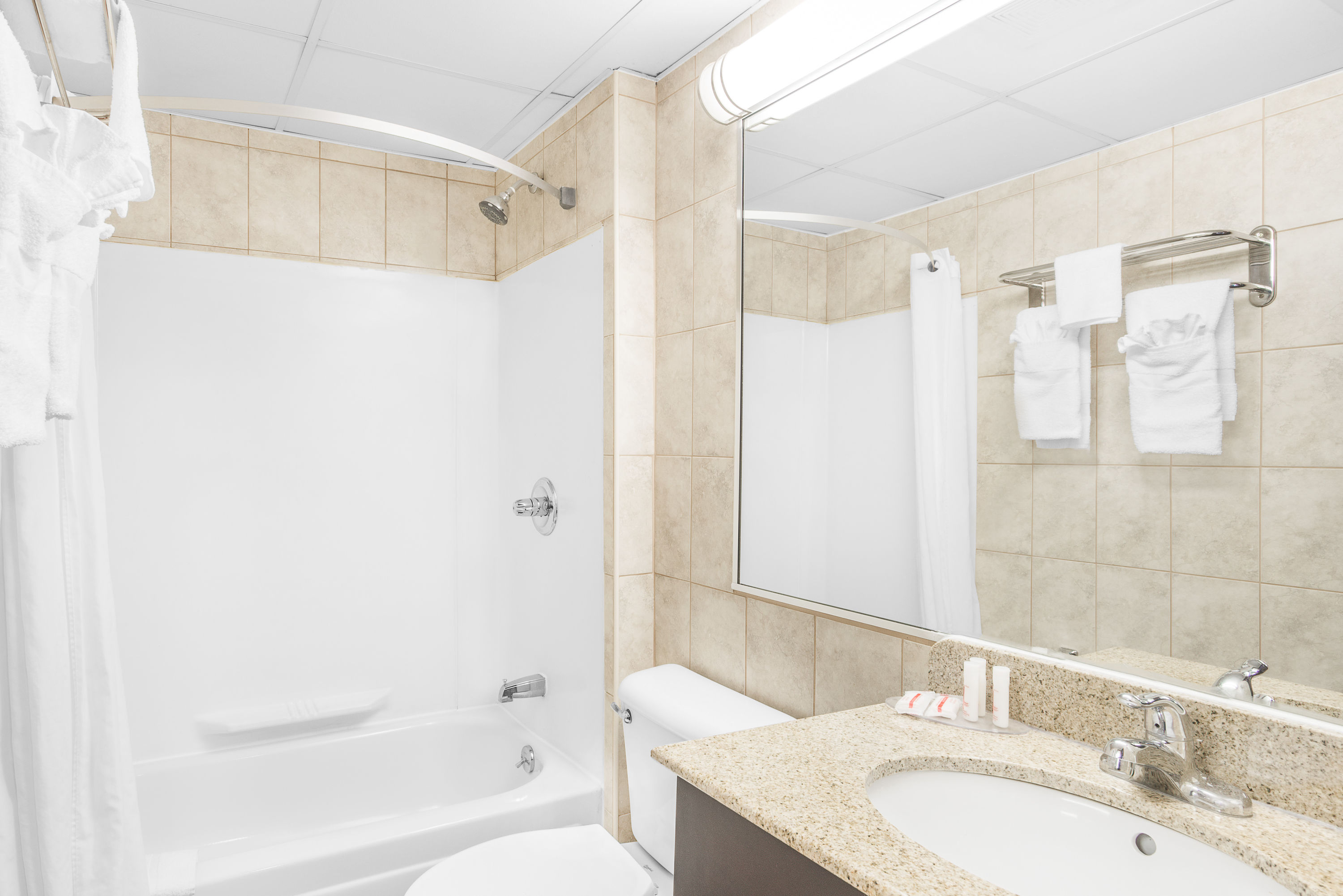 Guest room bath at the Howard Johnson by Wyndham North Bergen in North Bergen, New Jersey