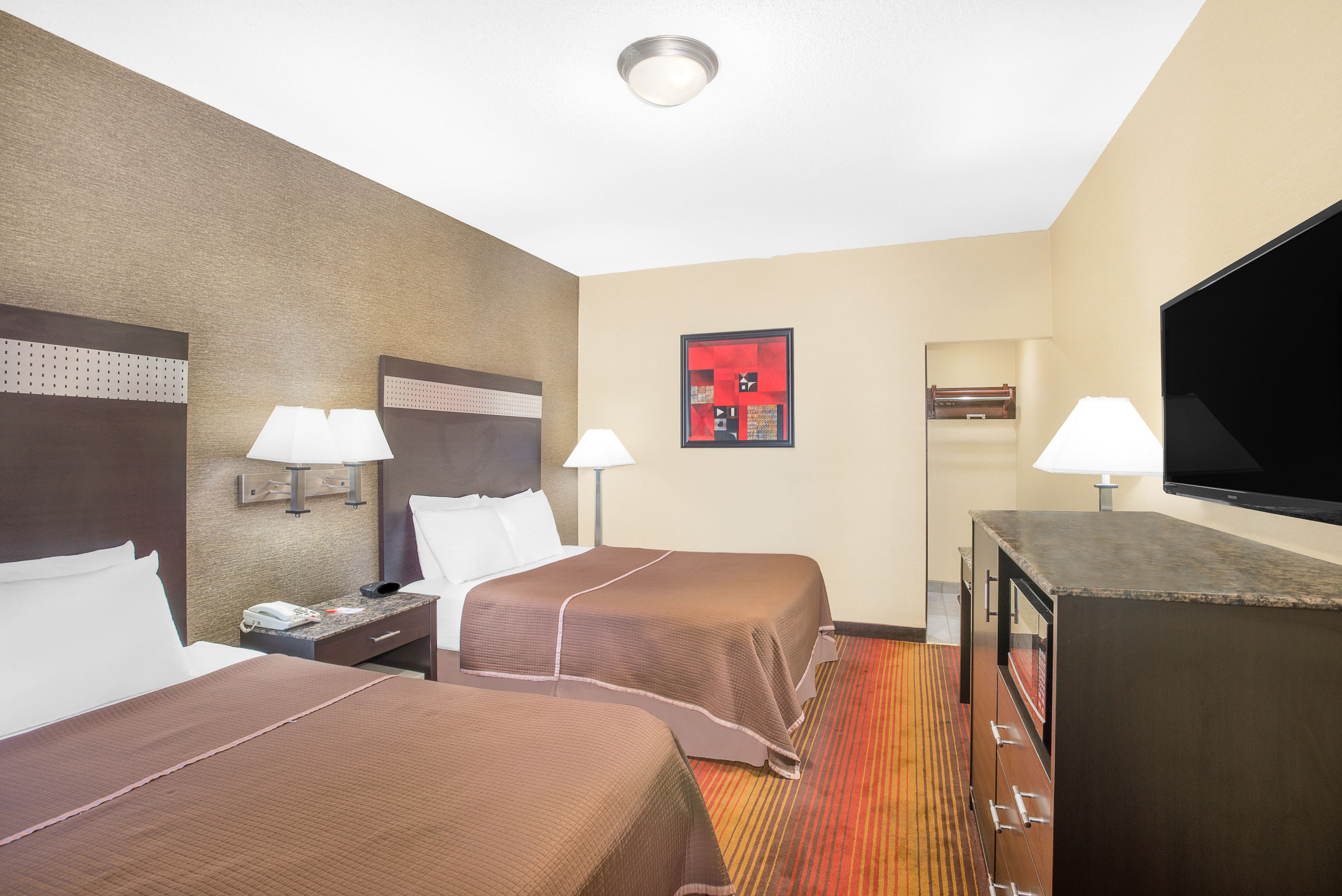 Guest room at the Howard Johnson by Wyndham North Bergen in North Bergen, New Jersey