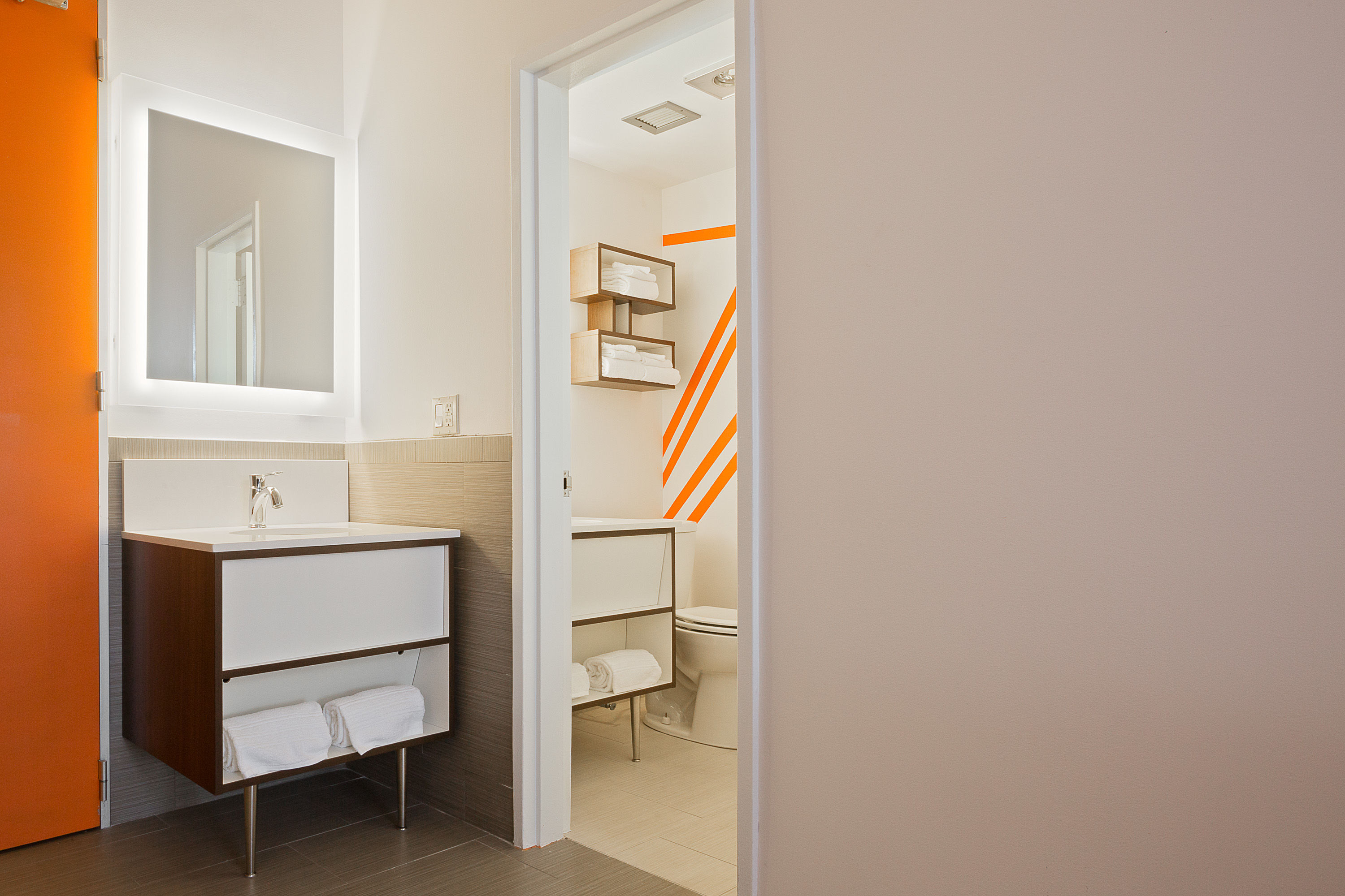 Guest room bath at the Howard Johnson by Wyndham Toms River in Toms River, New Jersey