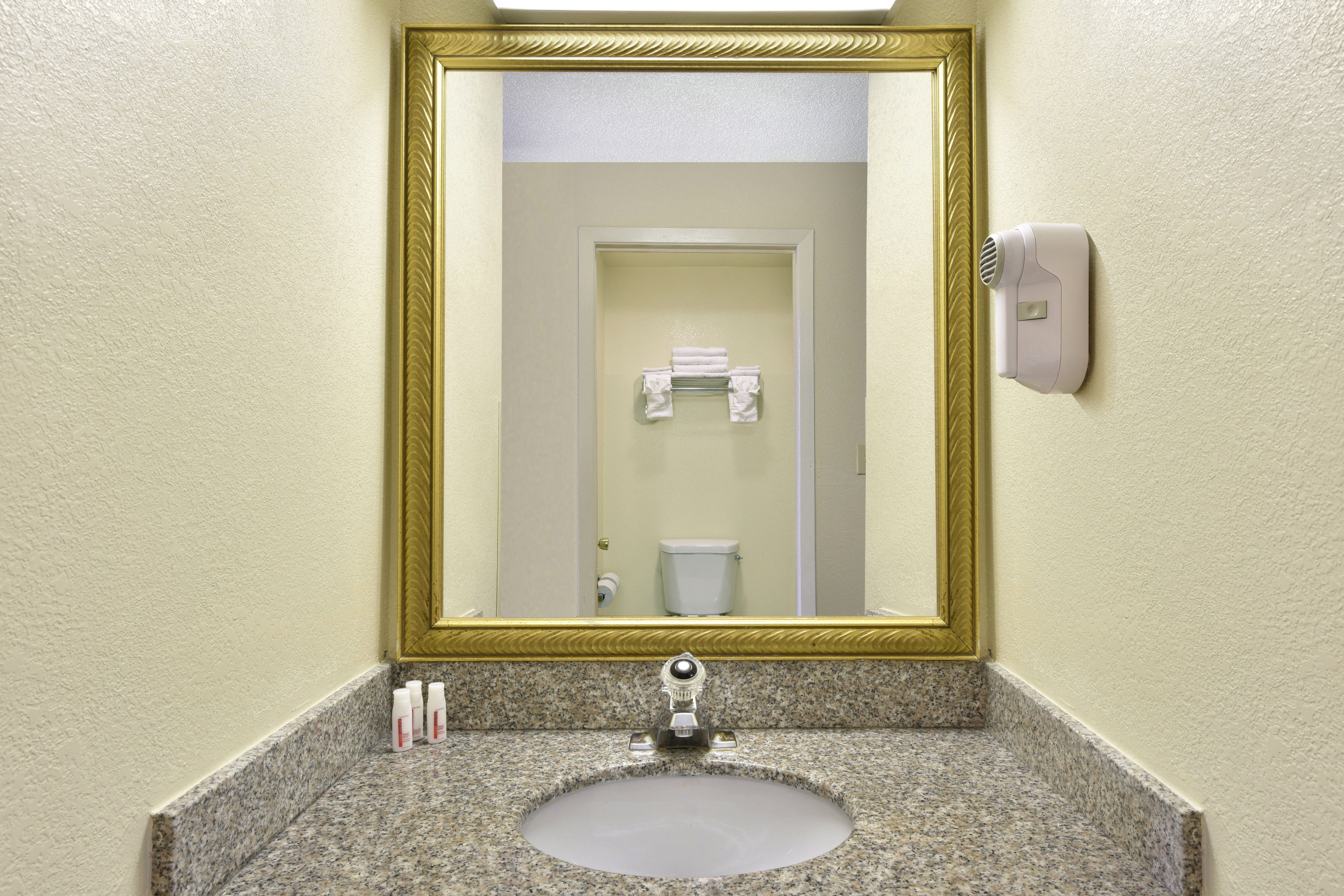 Guest room bath at the Howard Johnson by Wyndham Allentown Dorney Hotel & Suites in Allentown, Pennsylvania