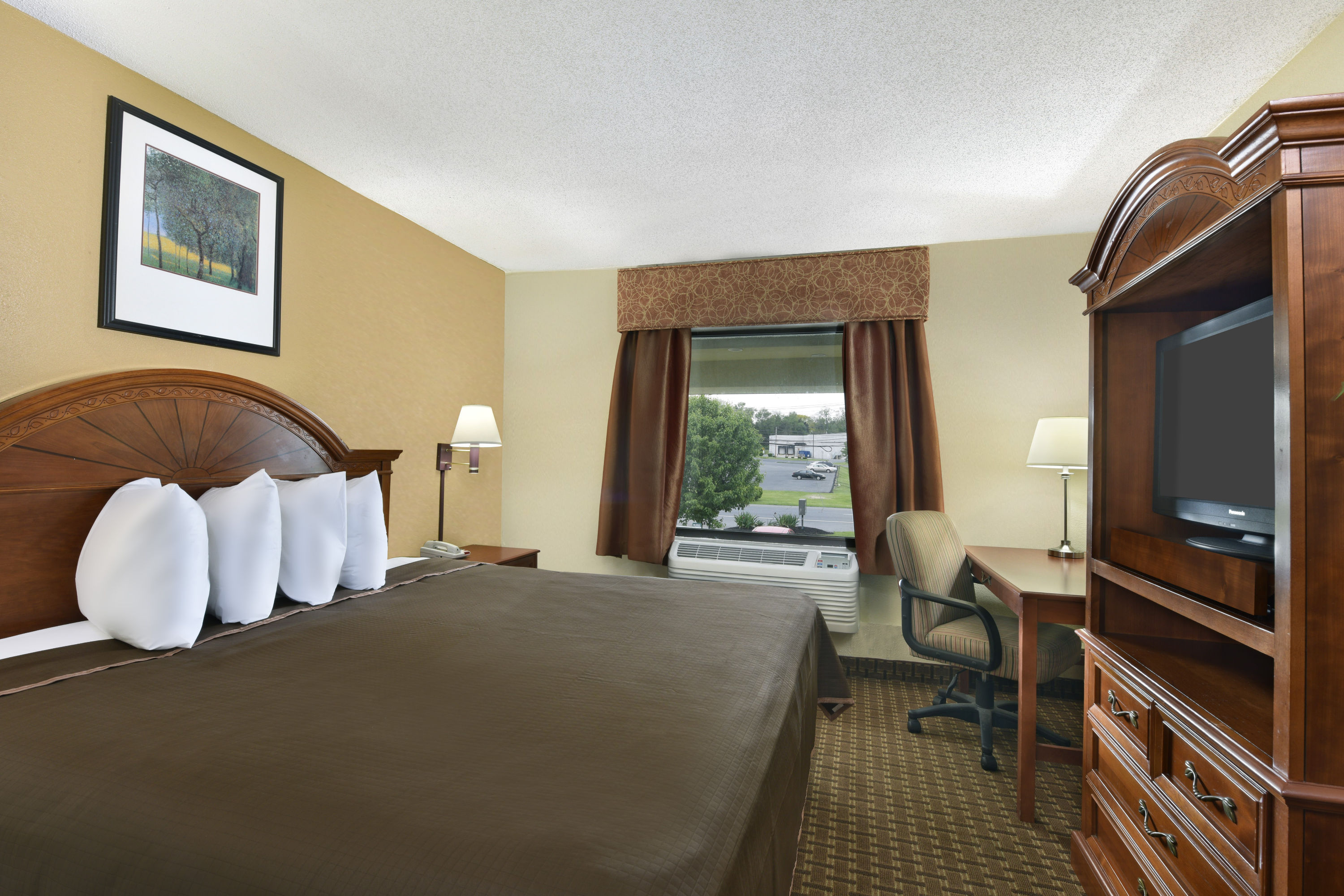 Guest room at the Howard Johnson by Wyndham Allentown Dorney Hotel & Suites in Allentown, Pennsylvania