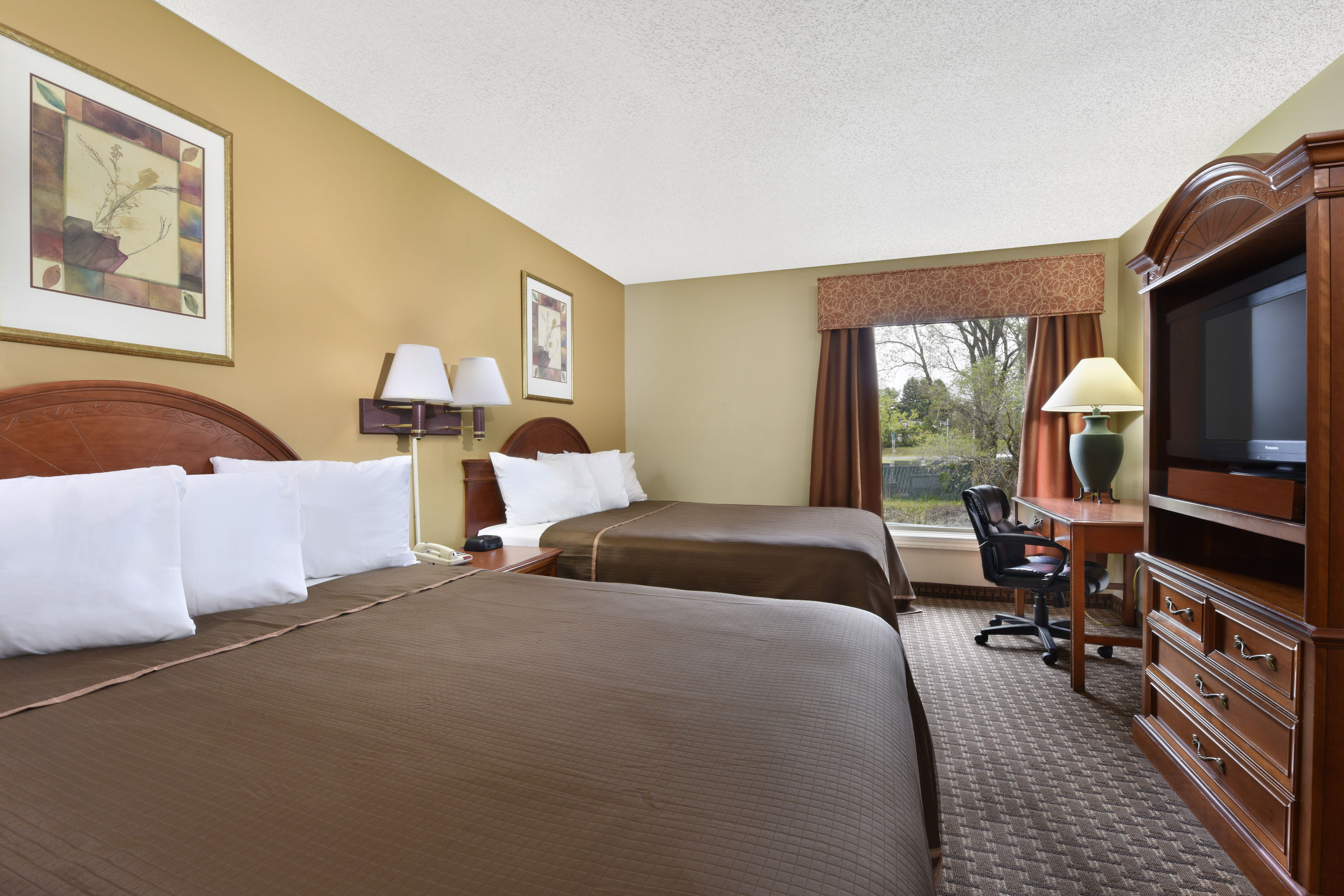 Guest room at the Howard Johnson by Wyndham Allentown Dorney Hotel & Suites in Allentown, Pennsylvania